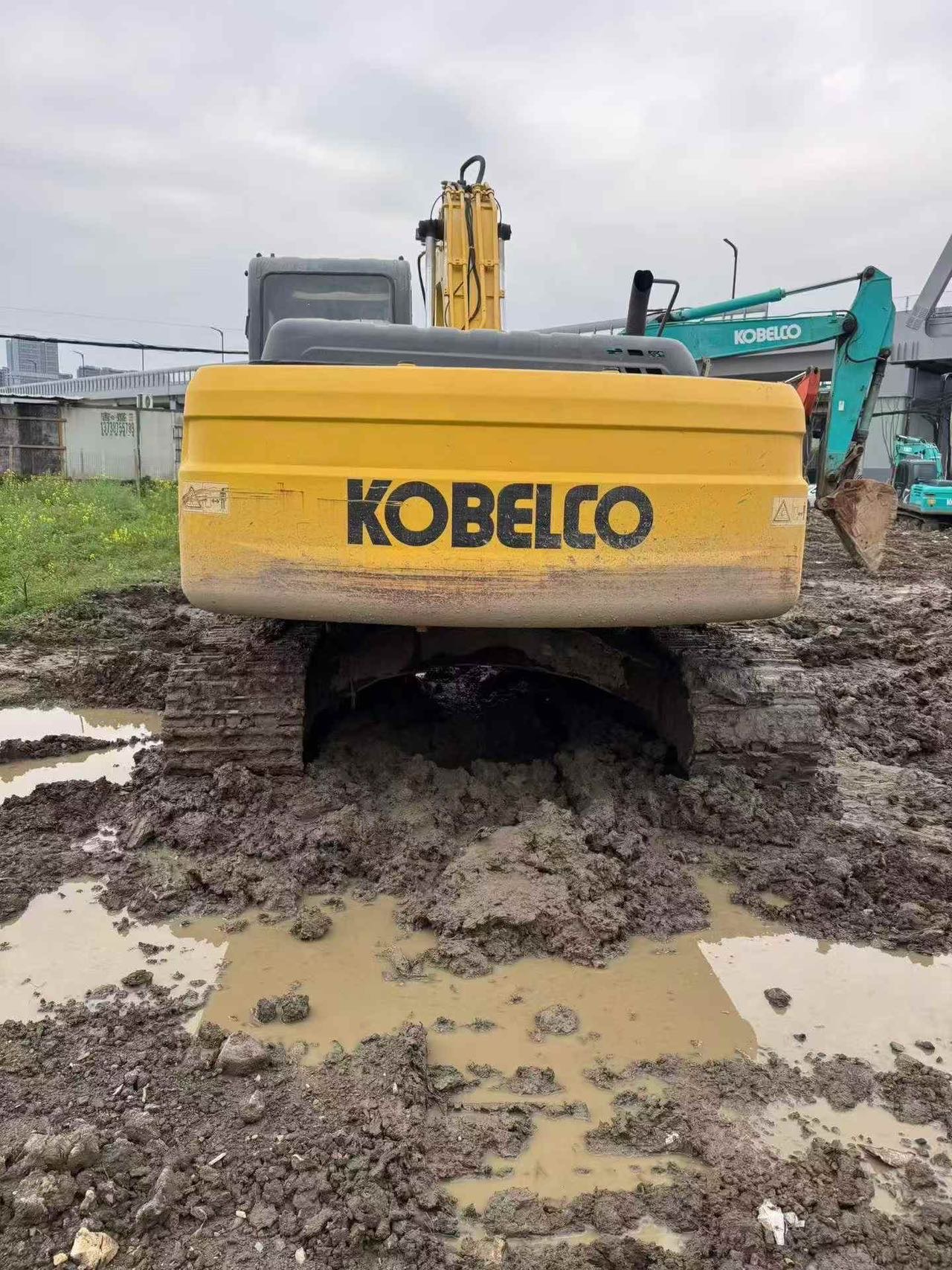 Buy Kobelco SK210 Used Excavator / 4