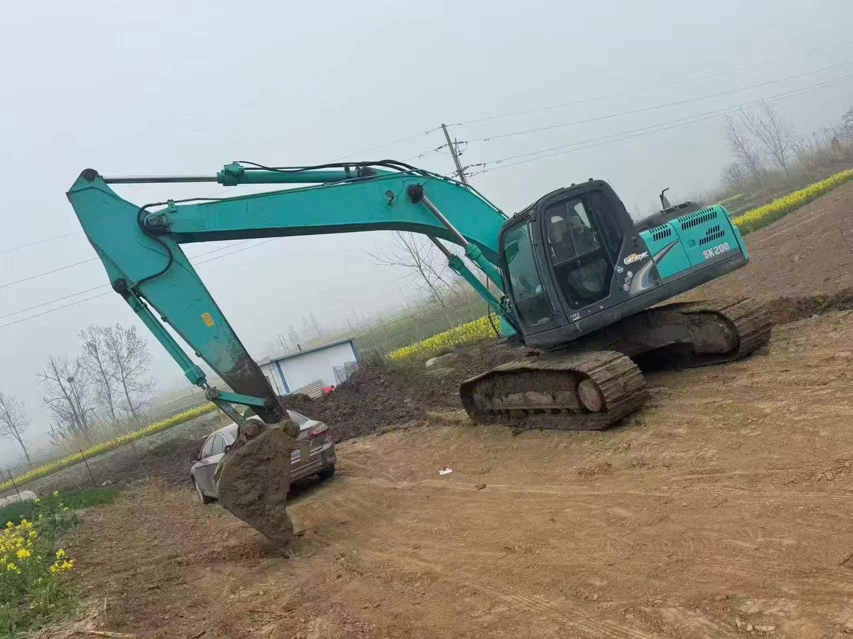 Buy Kobelco SK200 Used Excavator / 9