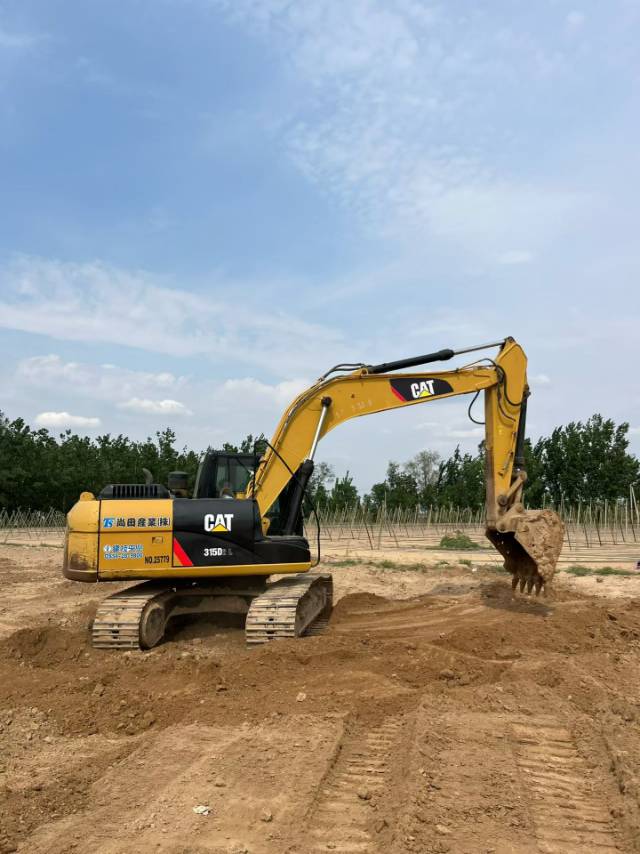 Купить Caterpillar M315D Подержанный Экскаватор