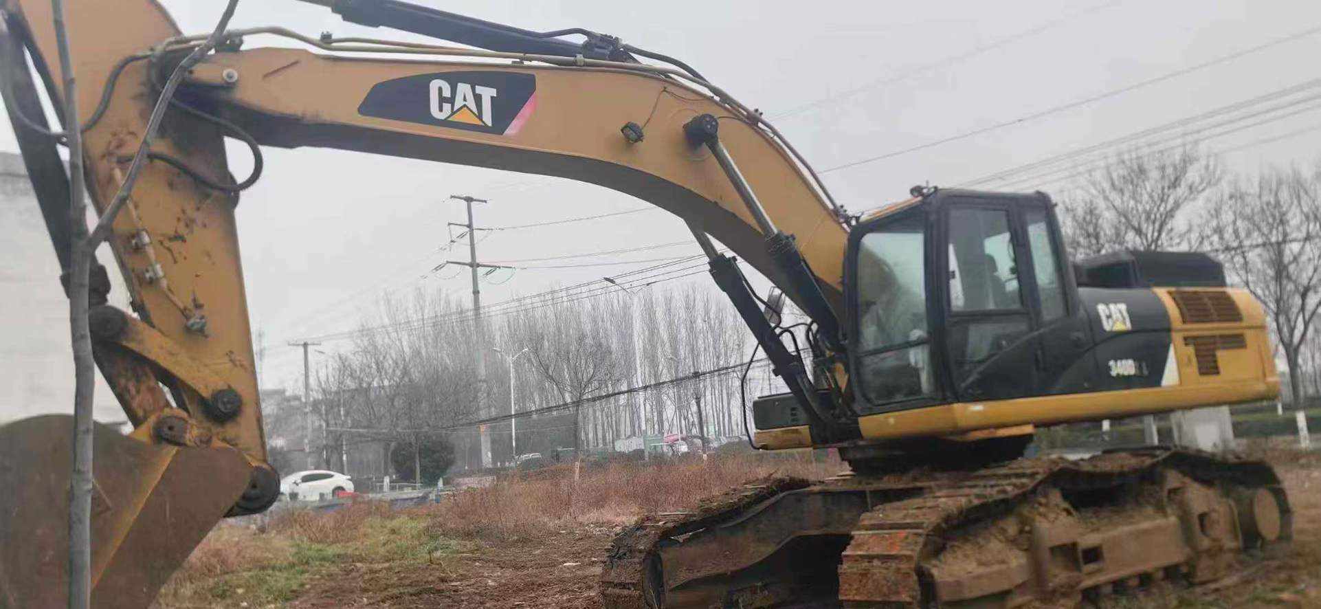 Buy Caterpillar 340DL Used Excavator