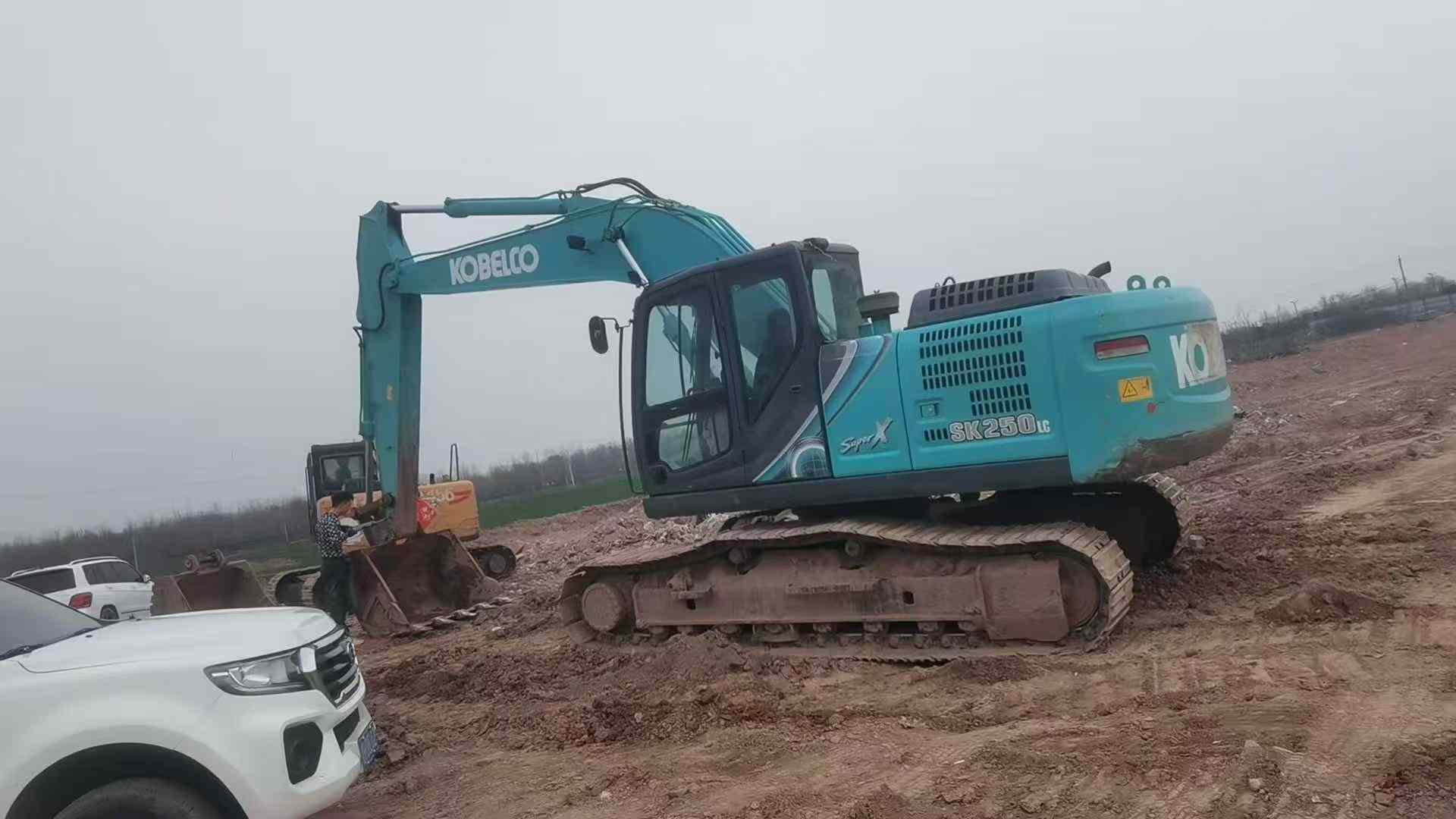 Buy Kobelco SK210-6 Used Excavator / 1