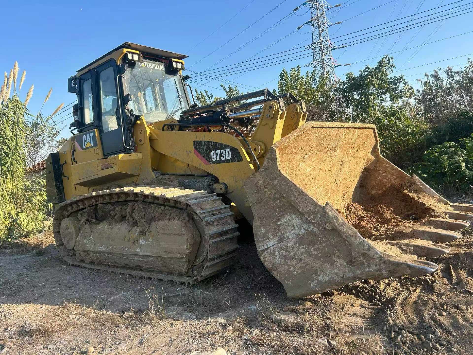 Buy Caterpillar 973D Used Excavator / 1