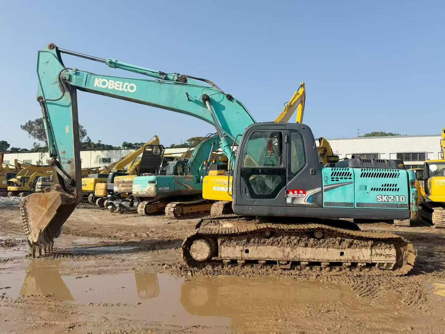 Buy Kobelco SK210 Used Excavator / 3