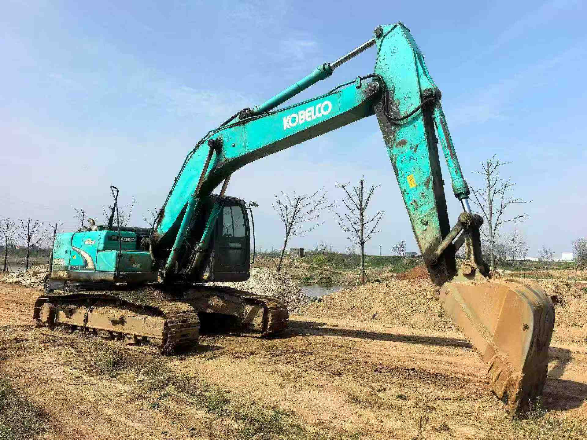 Buy Kobelco SK210 Used Excavator / 4
