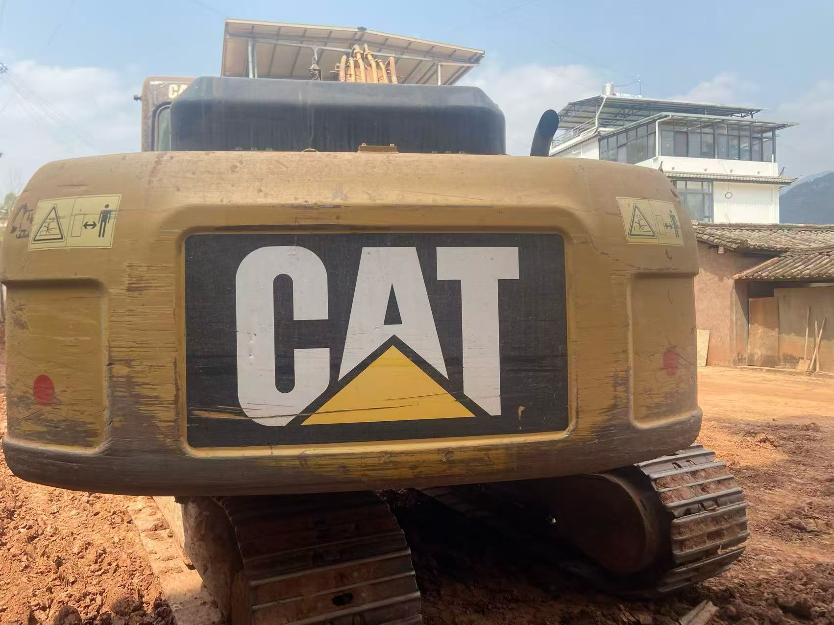 شراء Caterpillar M318 مستعمل حفارة