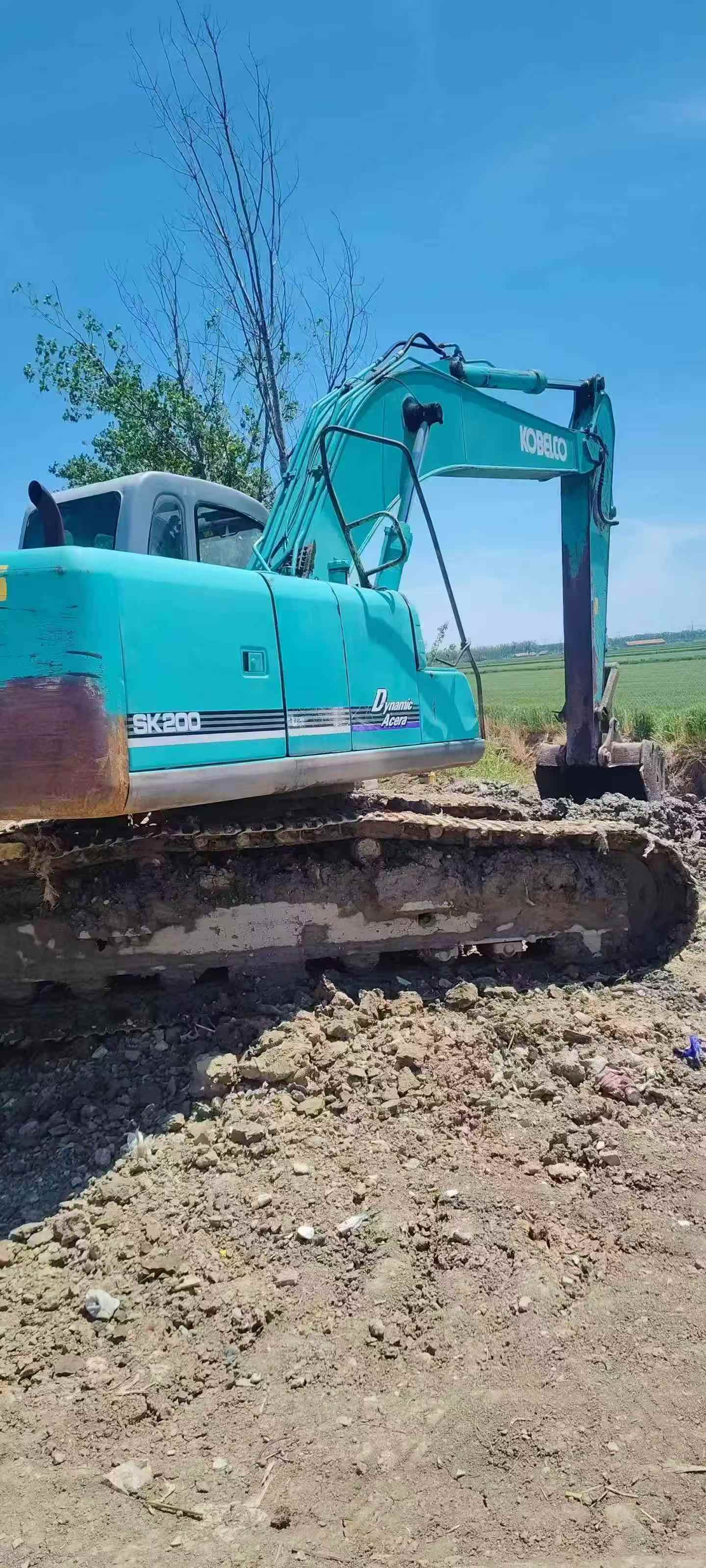 Buy Kobelco SK200 Used Excavator / 4