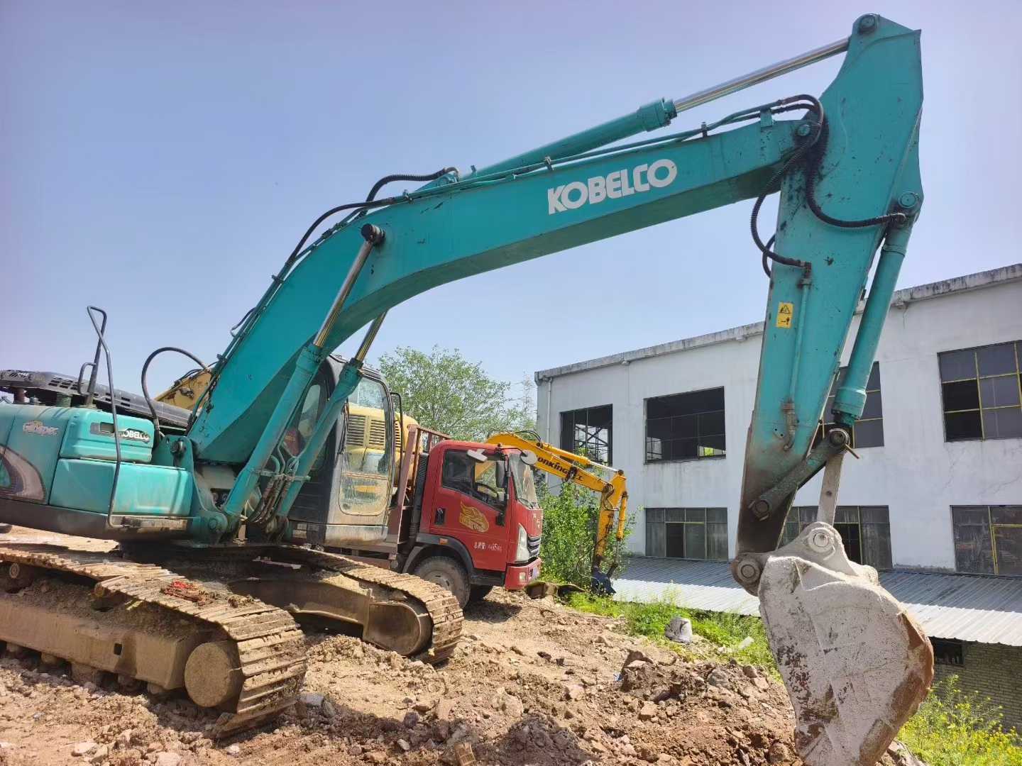 Buy Kobelco SK210 Used Excavator / 4
