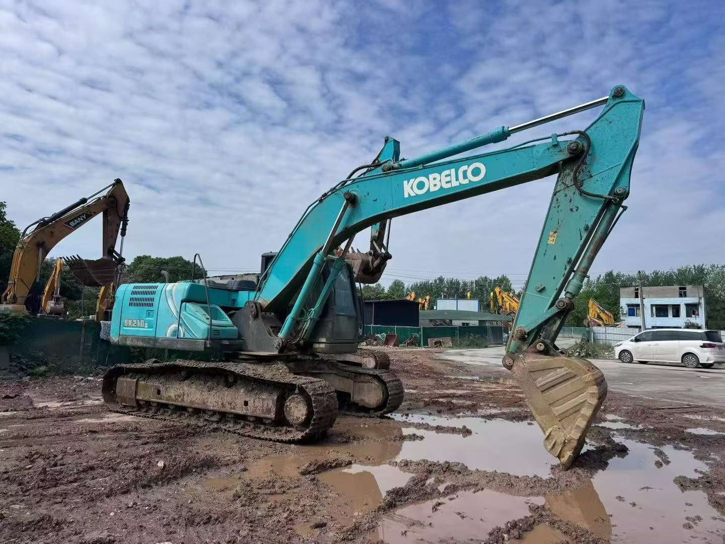 Buy Kobelco SK210 Used Excavator / 4