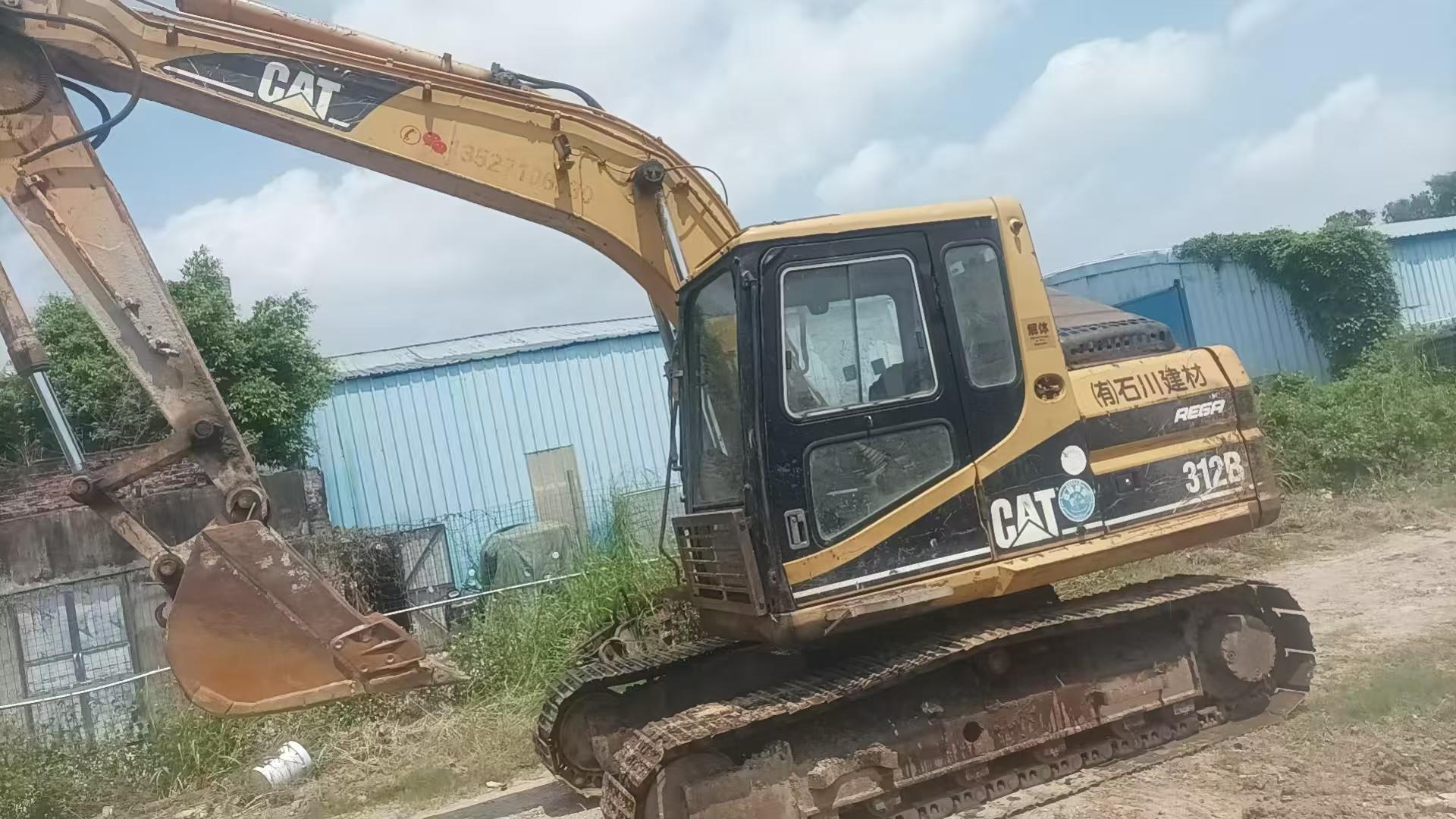 Купить Caterpillar 312B Подержанный Экскаватор