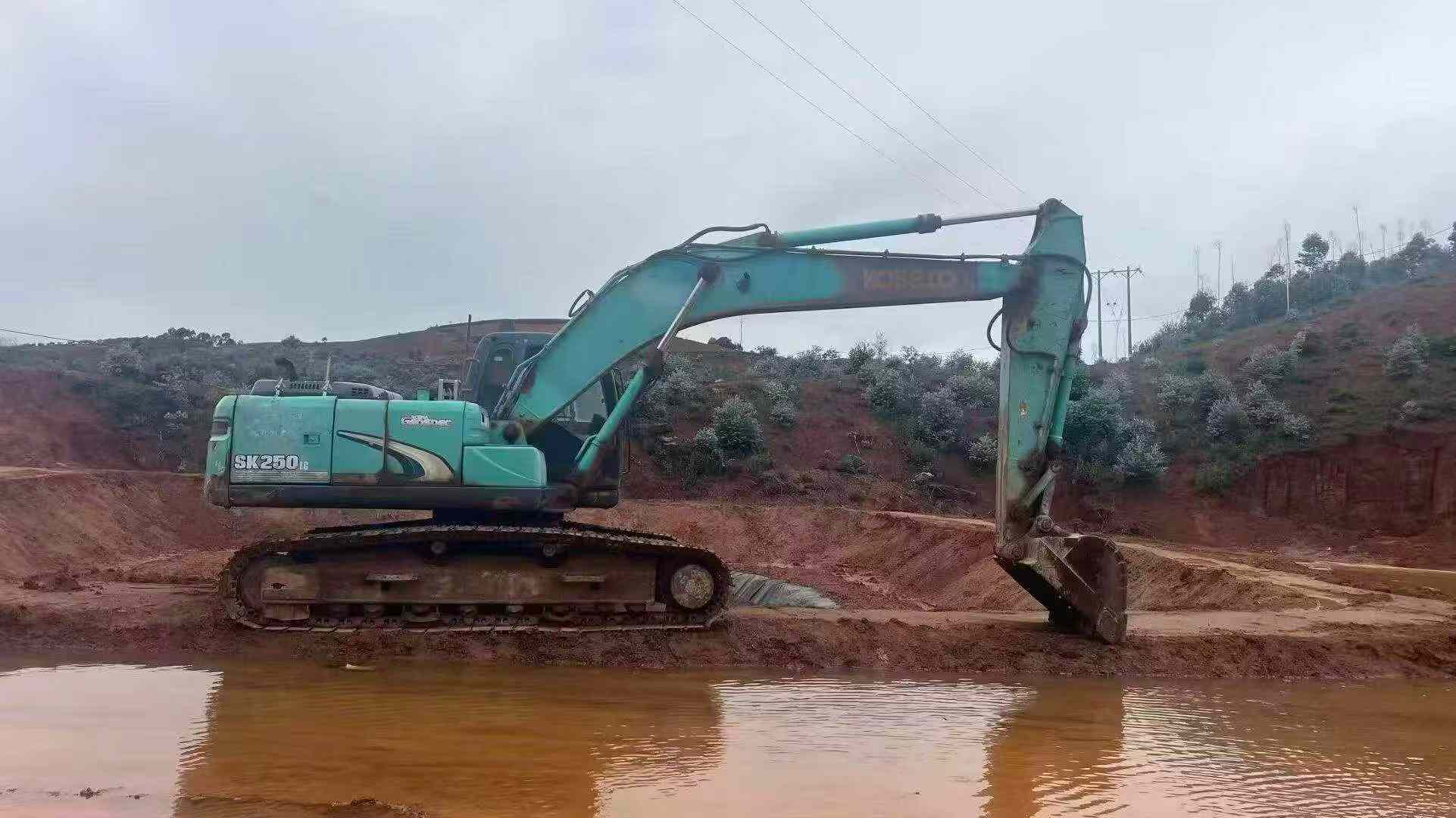 Buy Kobelco SK210 Used Excavator / 2