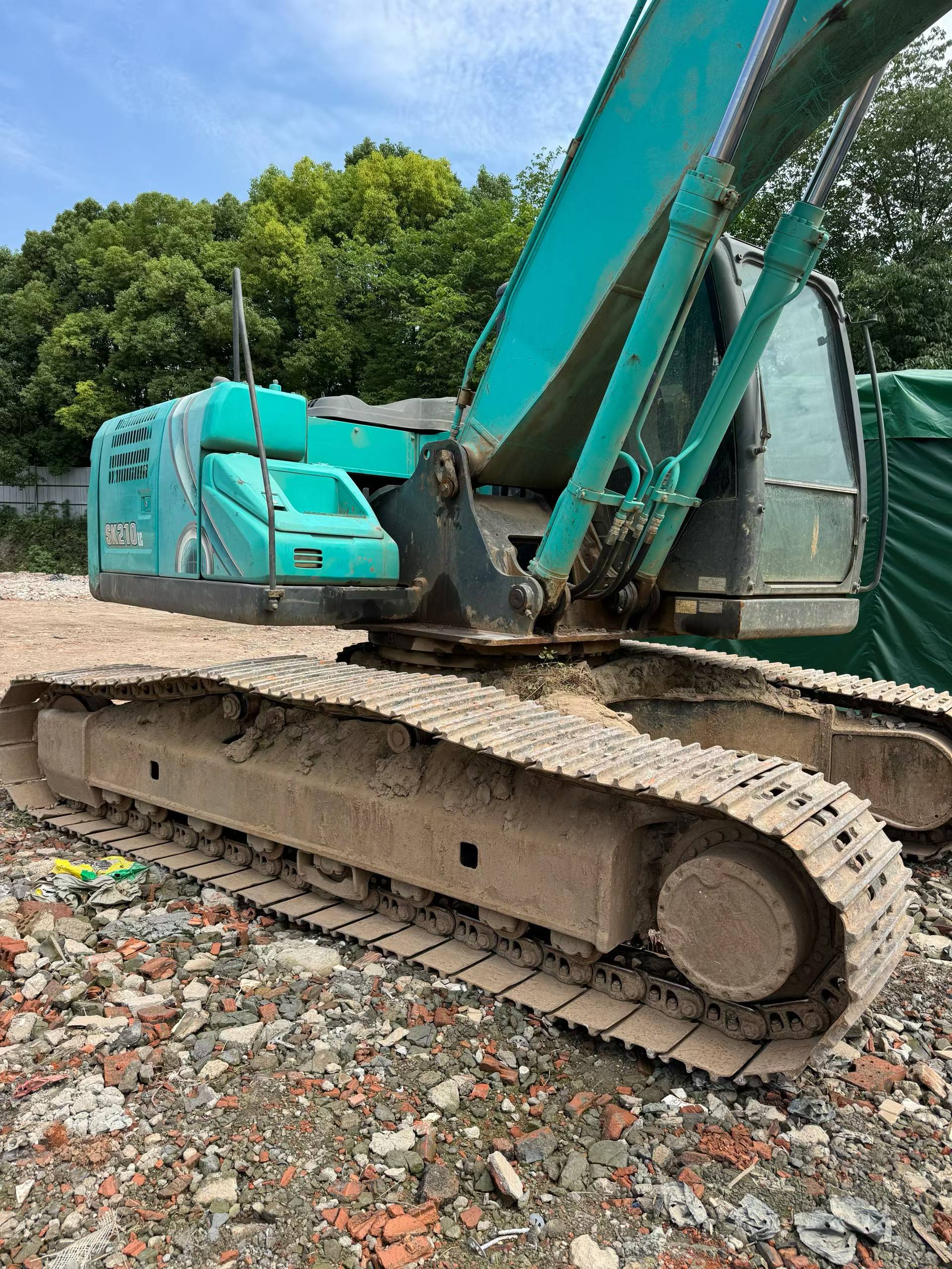 Buy Kobelco SK210 Used Excavator / 9