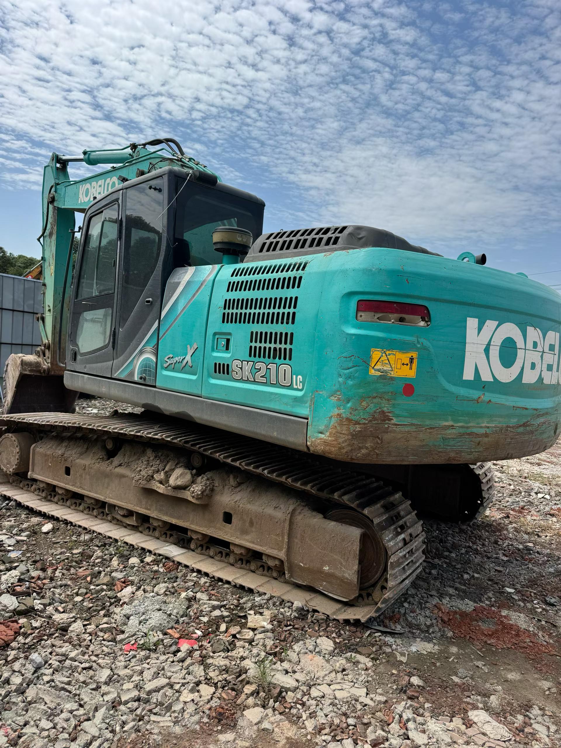 Buy Kobelco SK210 Used Excavator / 4