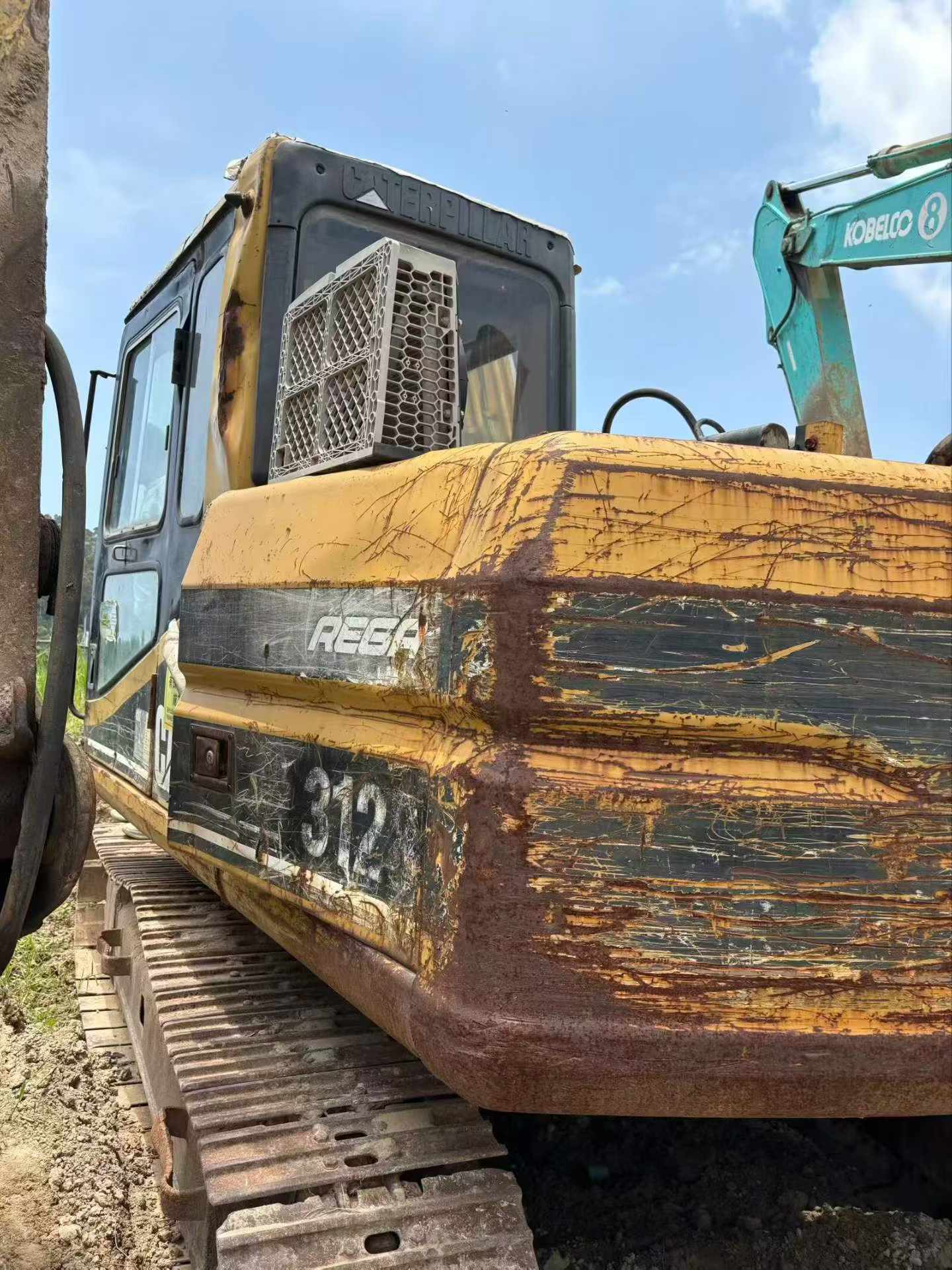 Купить Caterpillar 312B Подержанный Экскаватор