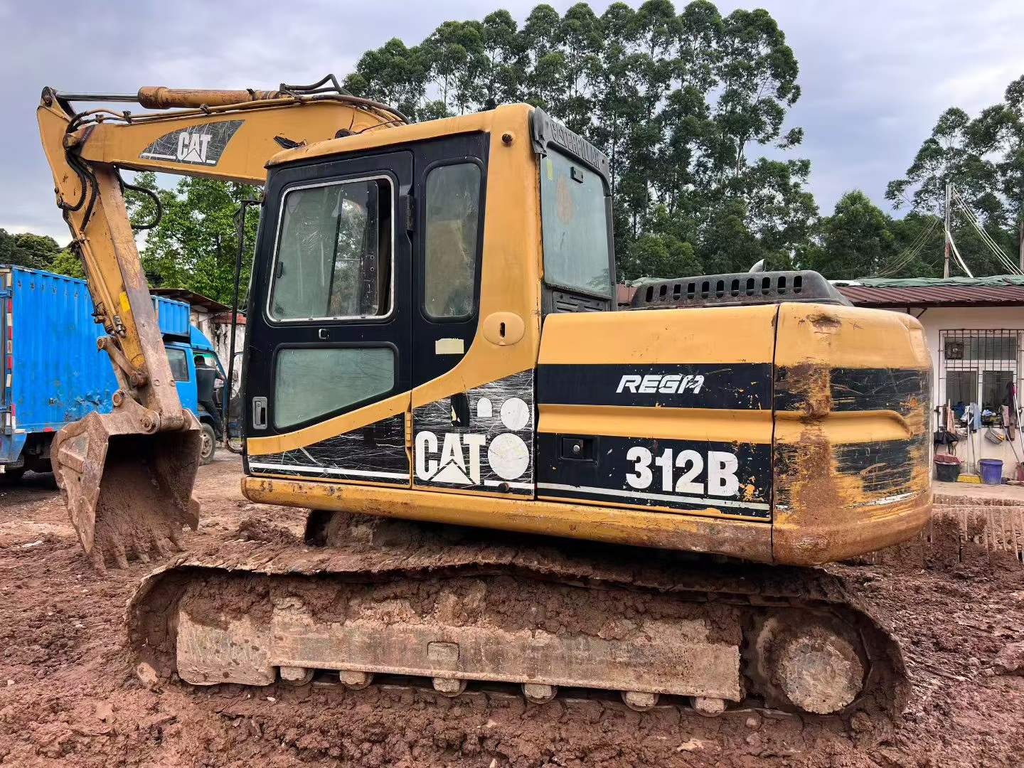 Купить Caterpillar 312B Подержанный Экскаватор