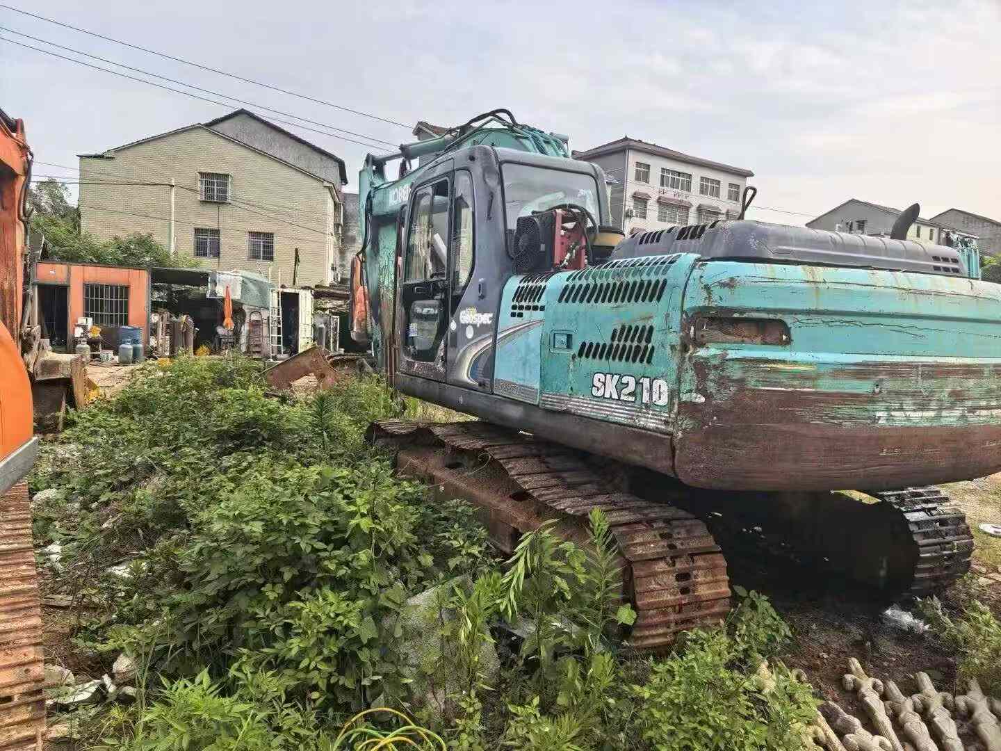 Buy Kobelco SK210 Used Excavator / 9
