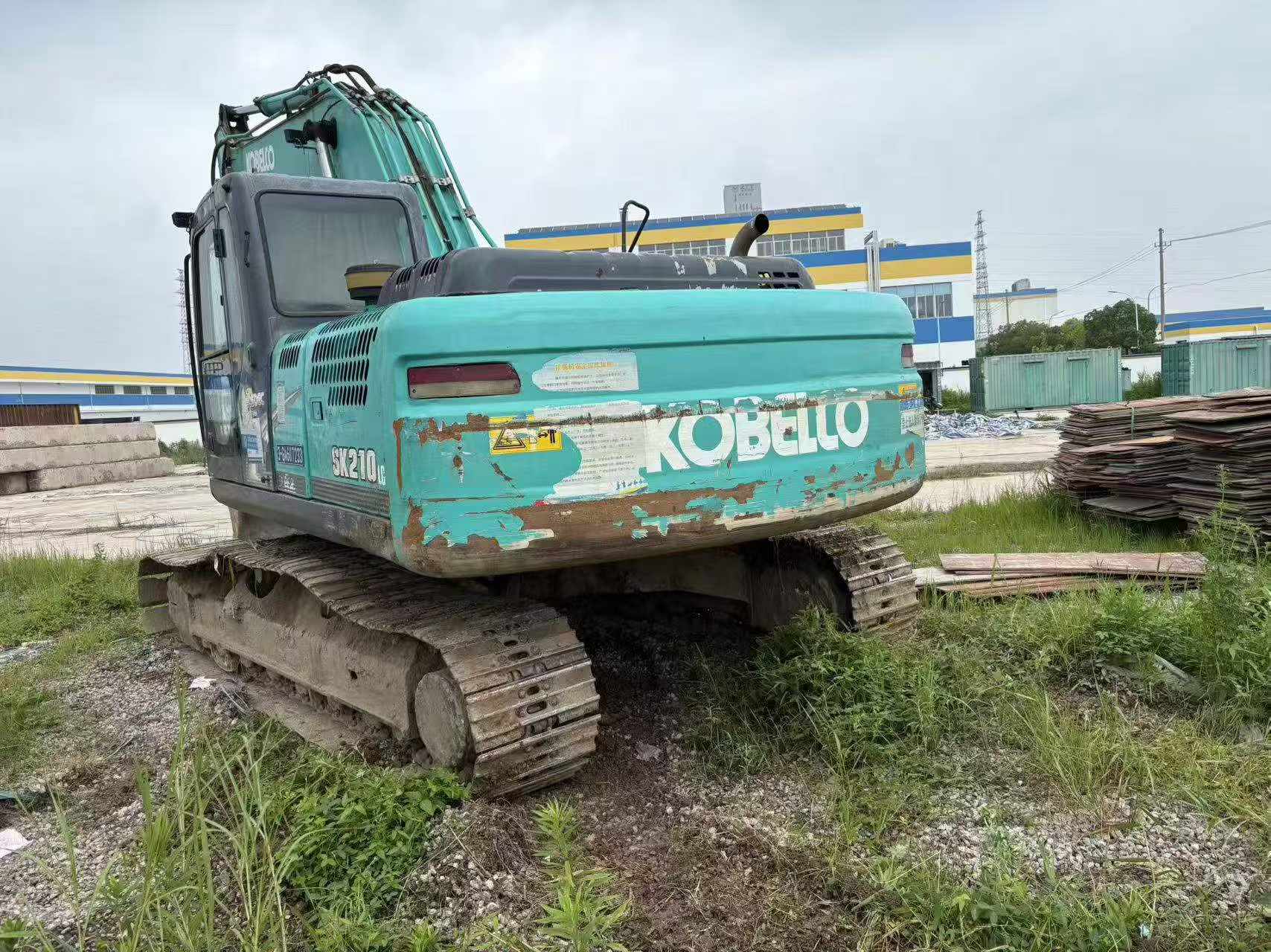 Buy Kobelco SK210 Used Excavator / 7