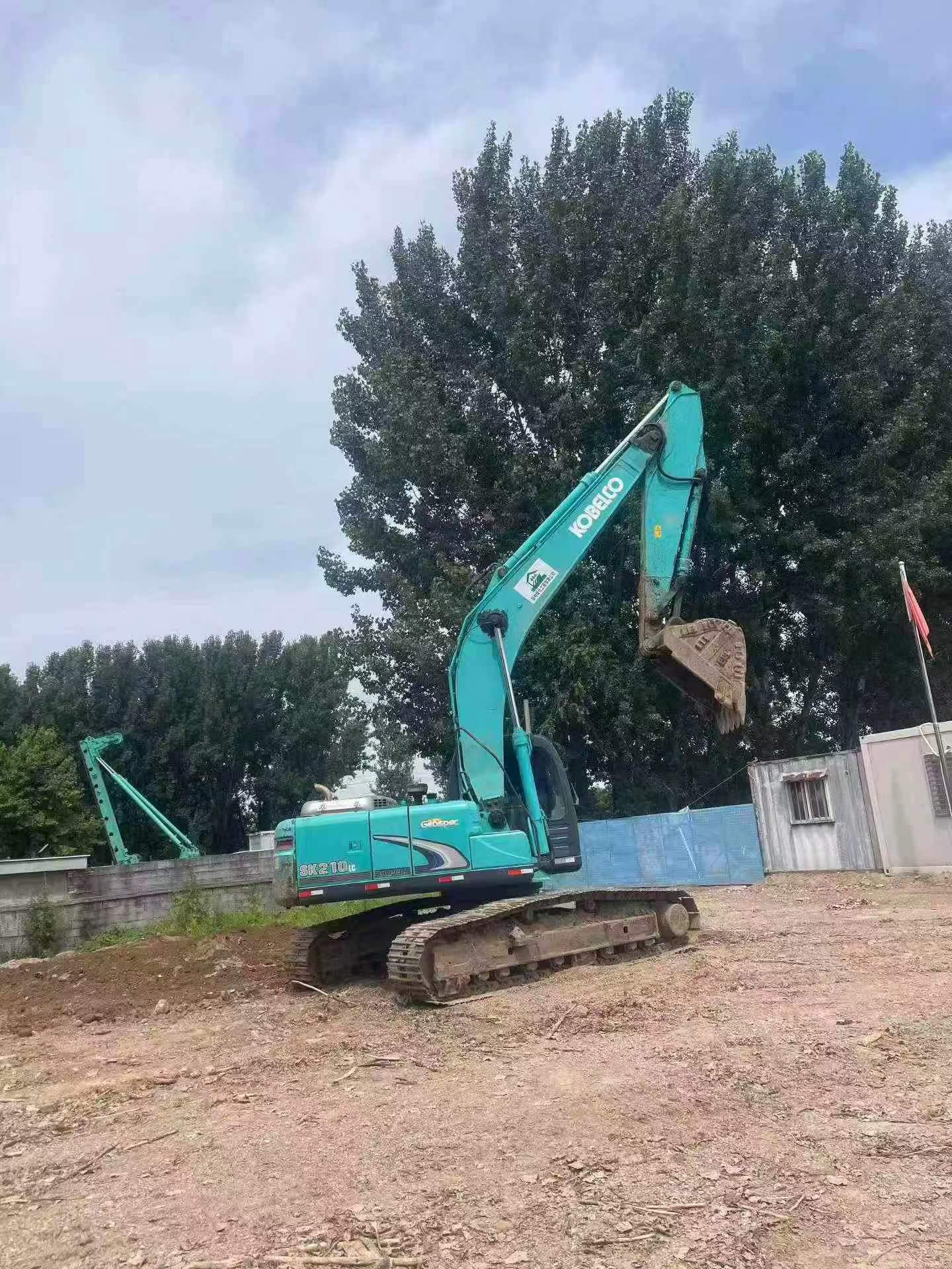 Buy Kobelco SK210 Used Excavator / 4