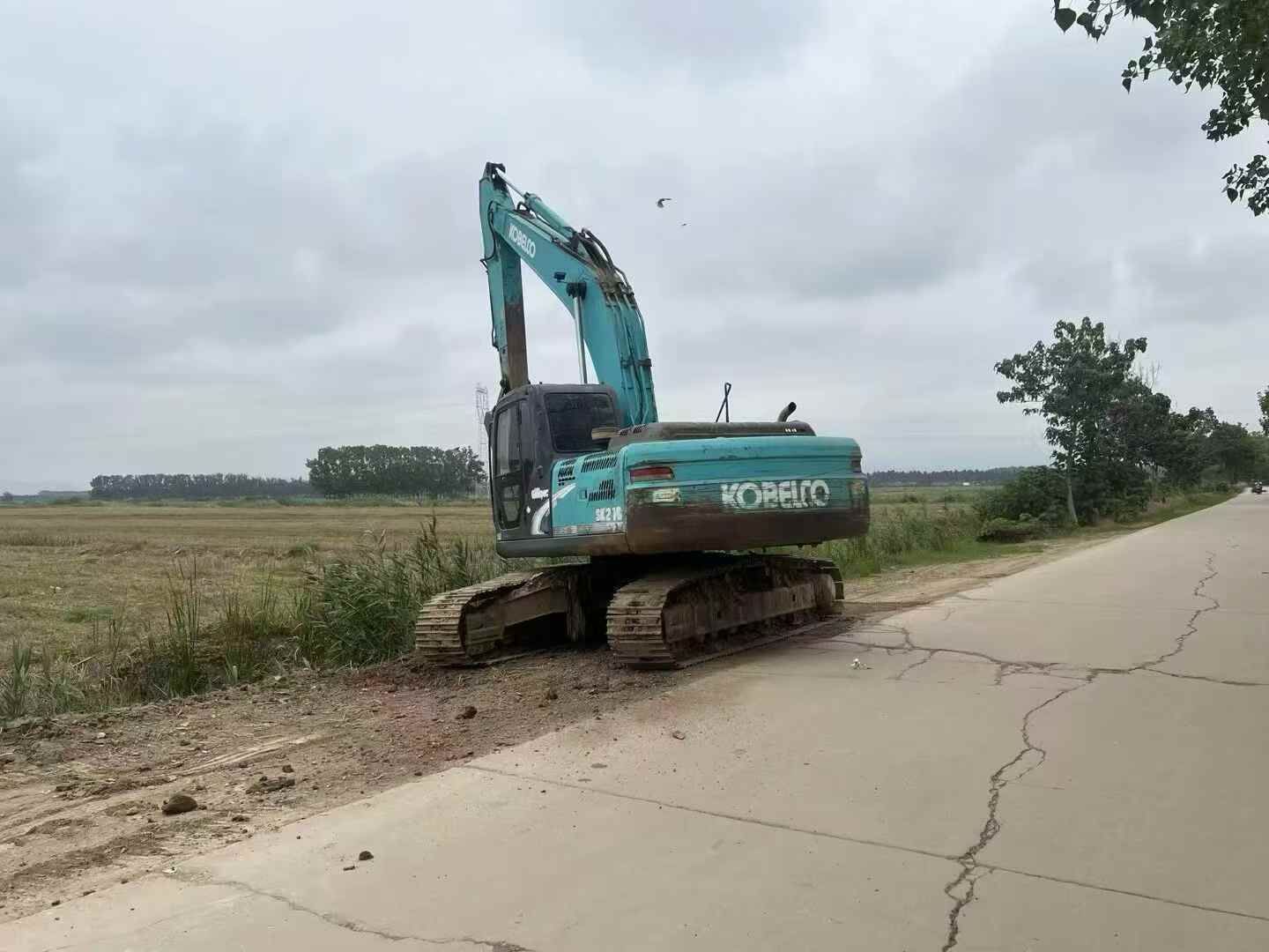 Buy Kobelco SK210 Used Excavator / 9