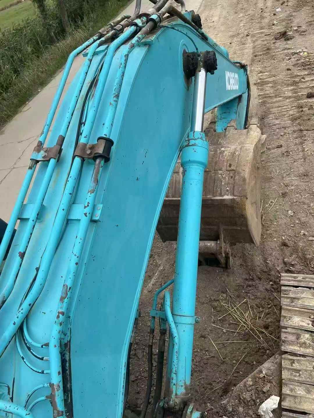 Buy Kobelco SK210 Used Excavator / 4
