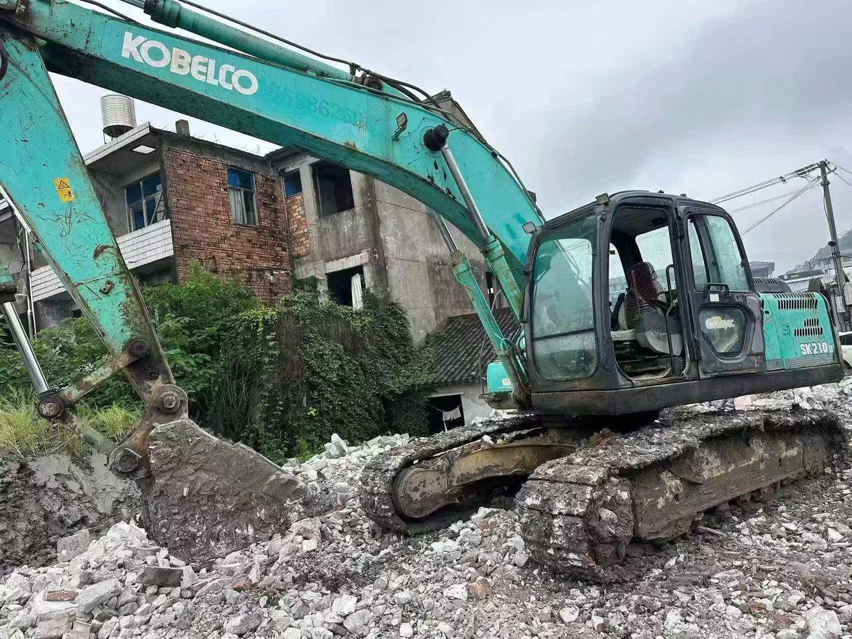 Buy Kobelco SK210 Used Excavator / 3