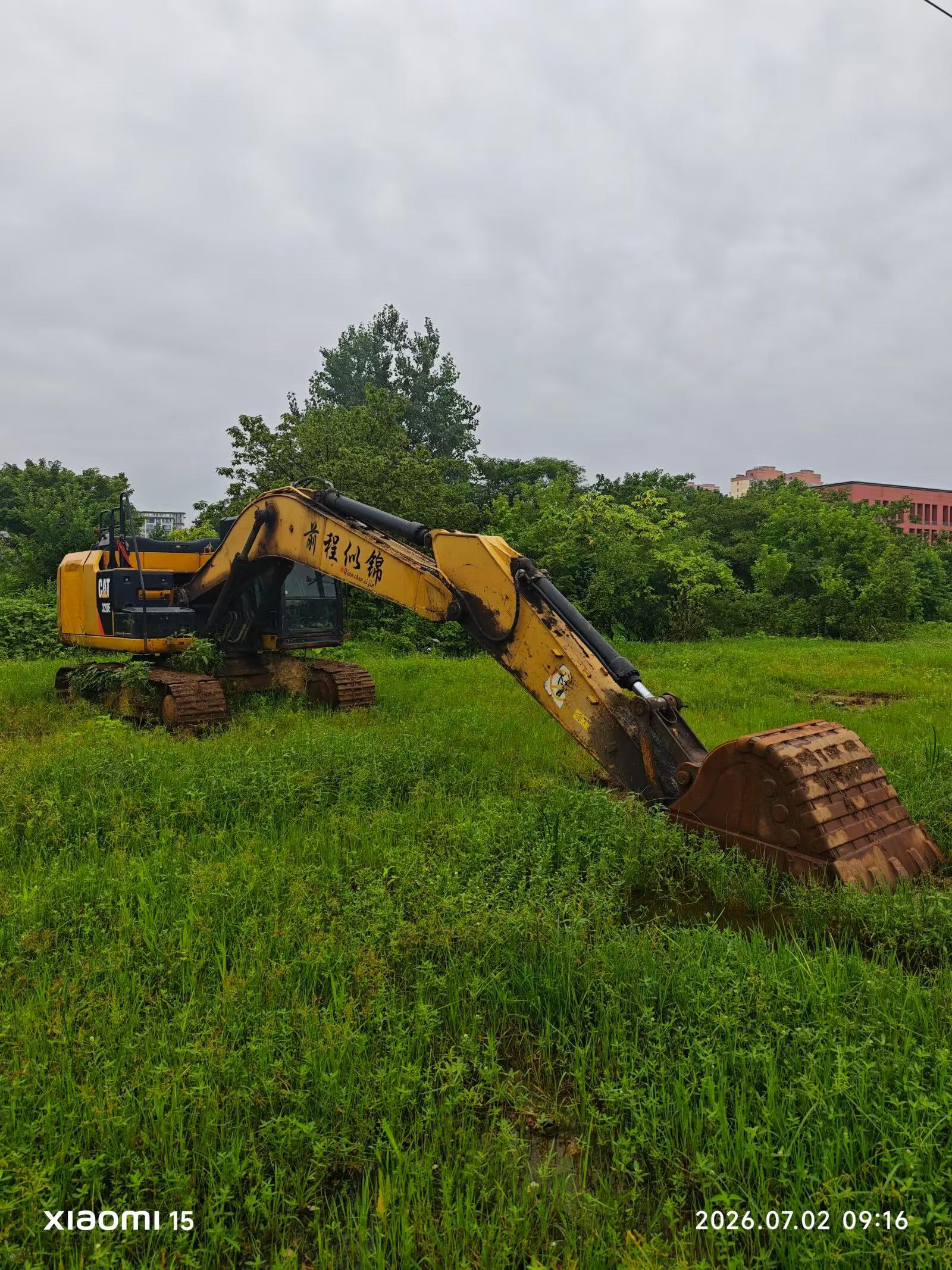Comprar Caterpillar 320E Usado Escavadeira