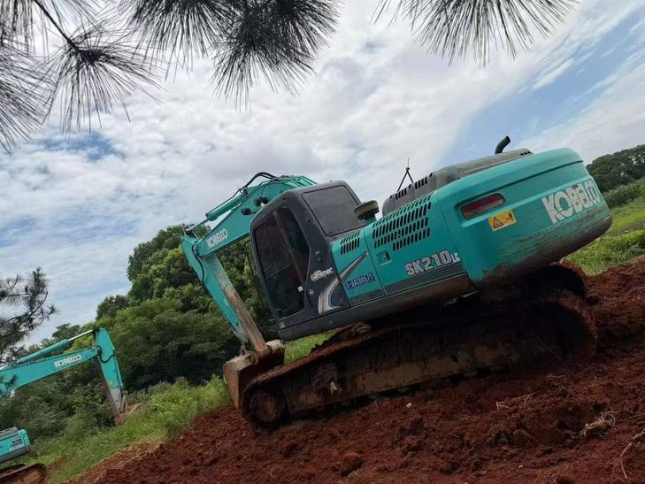Buy Kobelco SK210 Used Excavator / 1