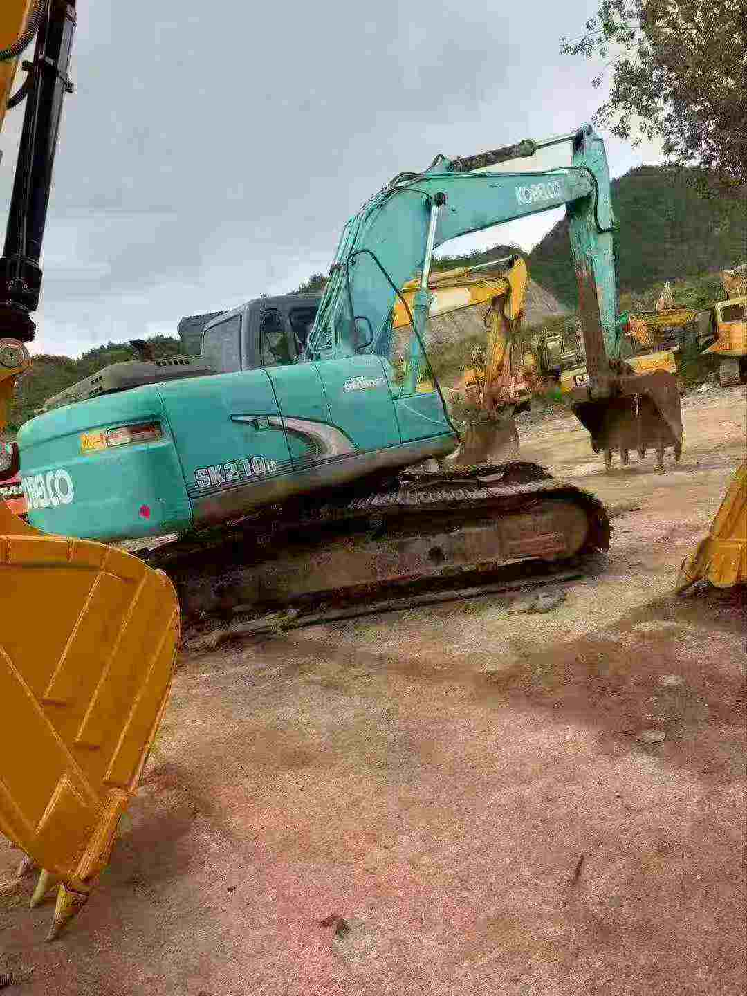 Buy Kobelco SK210 Used Excavator / 2