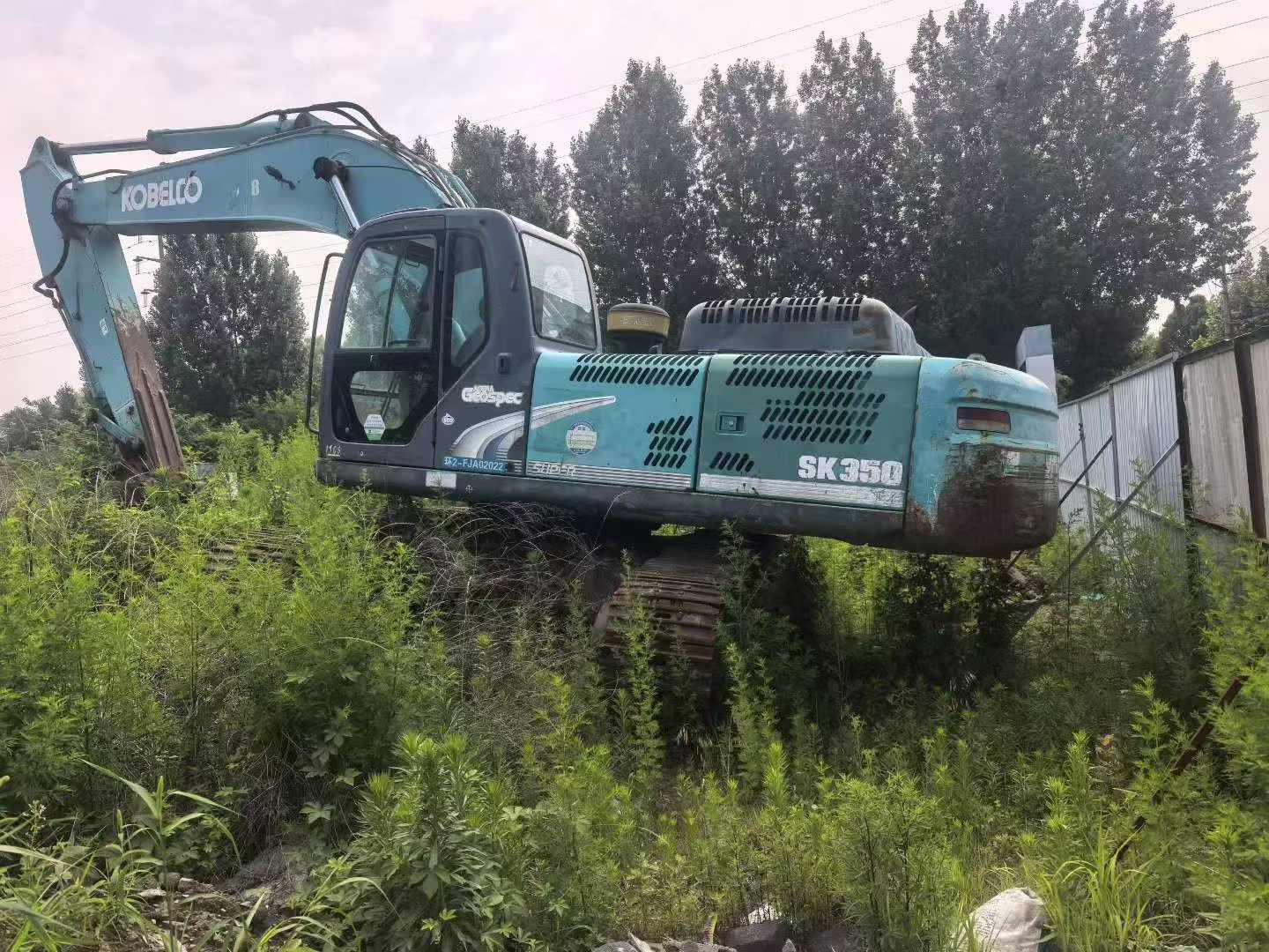 Купить Подержанный Экскаватор Kobelco SK330 / 8 Купить Подержанный Экскаватор Kobelco SK330 / 8