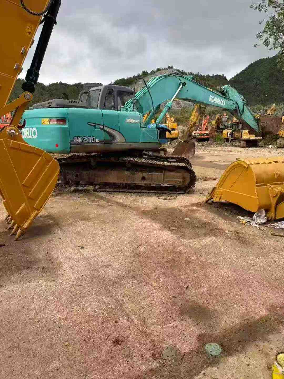 Buy Kobelco SK210 Used Excavator / 3