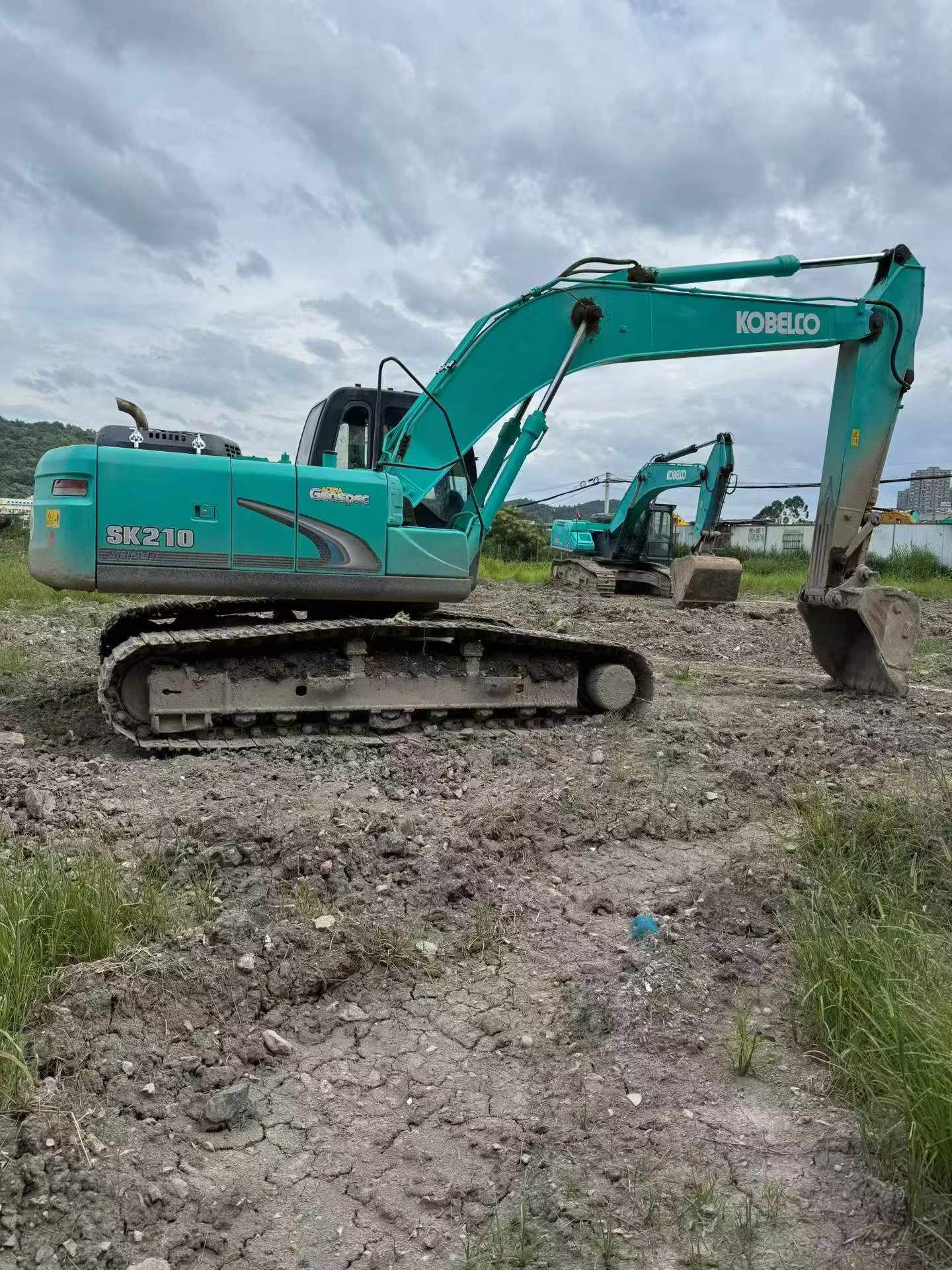 Buy Kobelco SK210 Used Excavator / 9