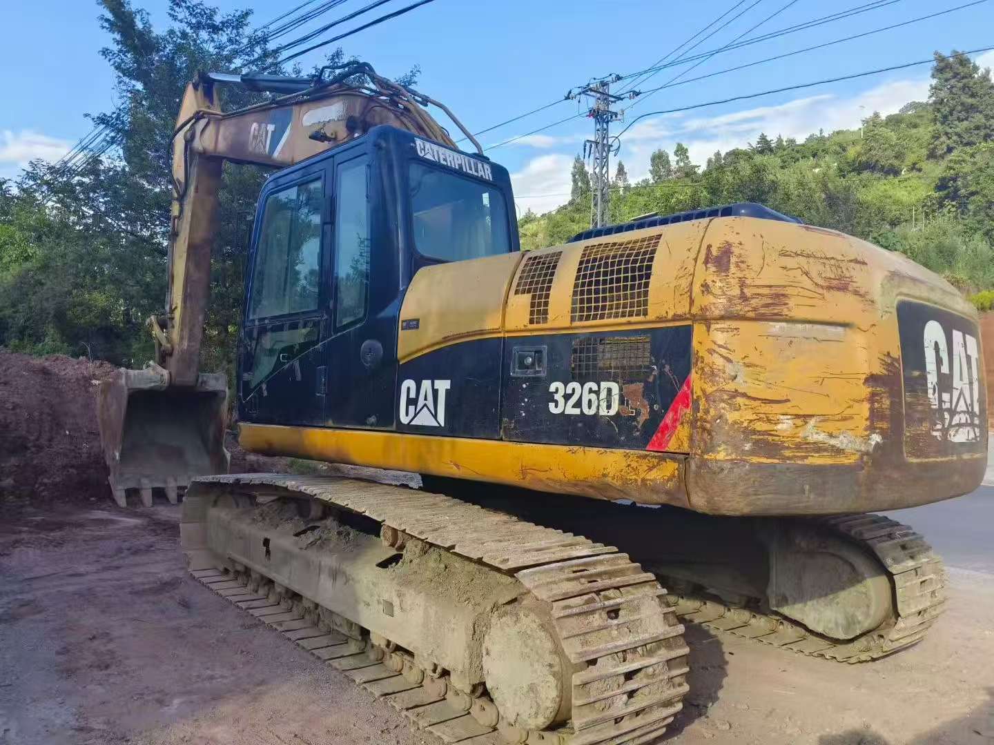شراء Caterpillar 323 مستعمل حفارة