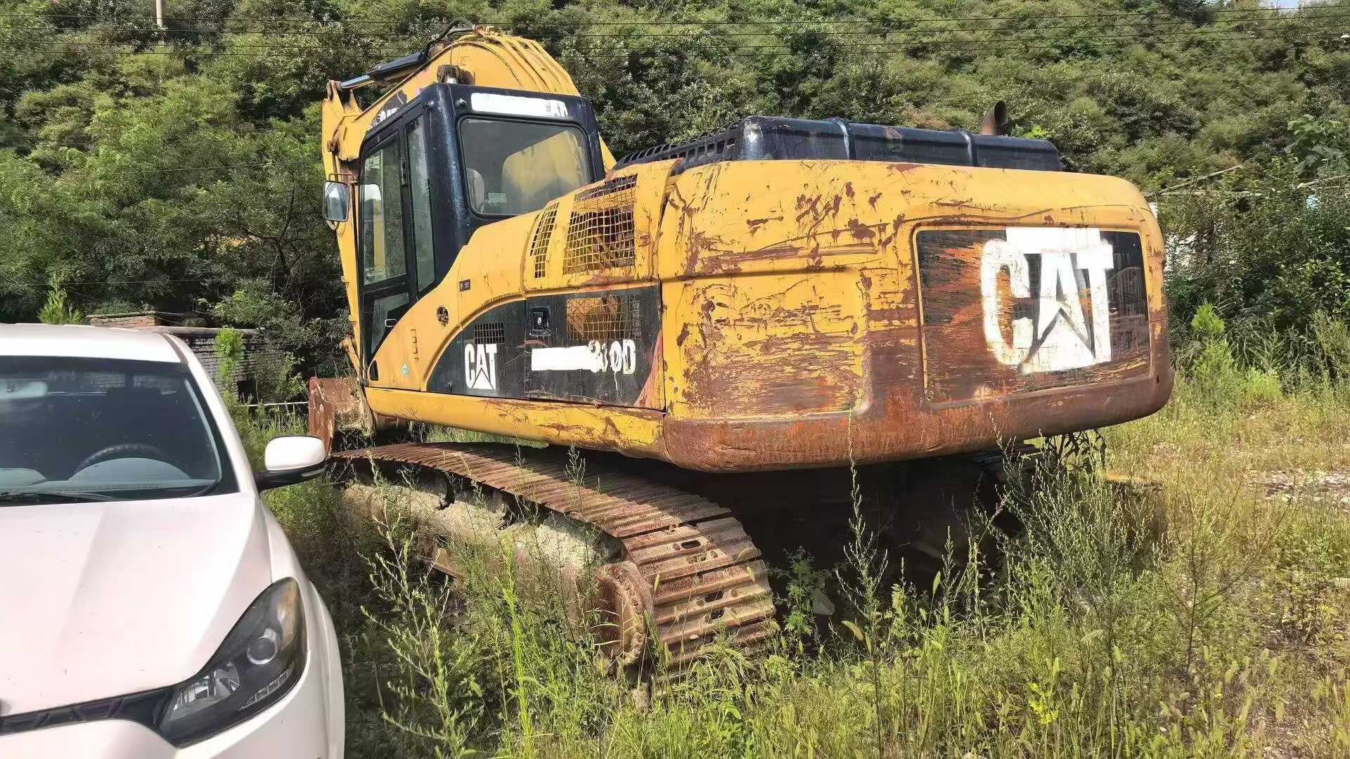 شراء حفارة Caterpillar 325B مستعملة / 2