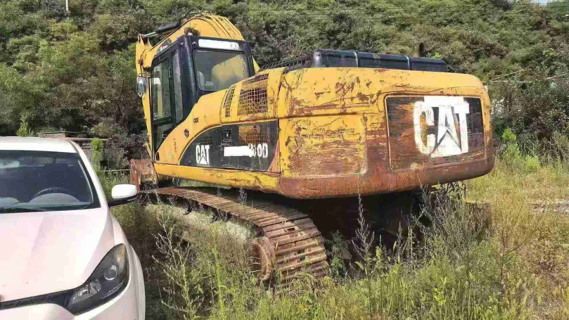 شراء حفارة Caterpillar 325B مستعملة / 2