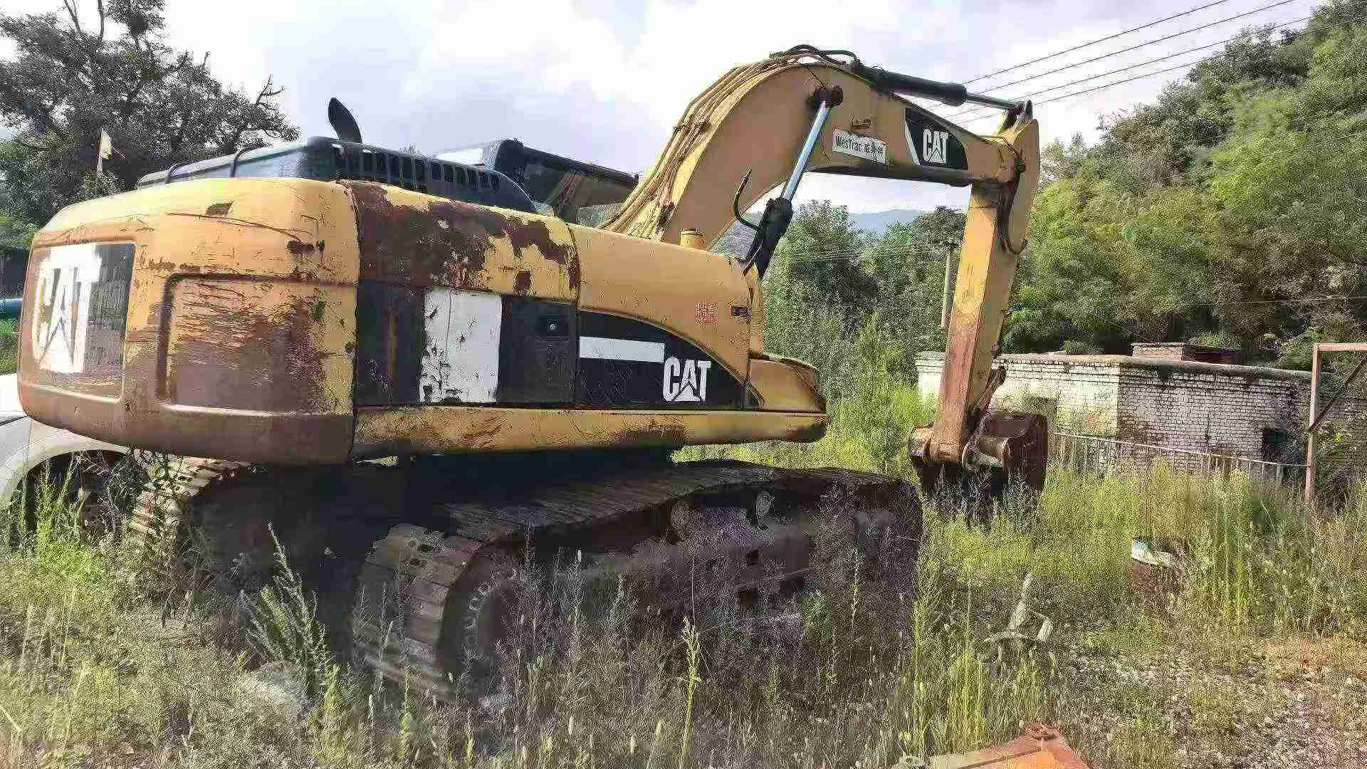 شراء حفارة Caterpillar 325B مستعملة / 3