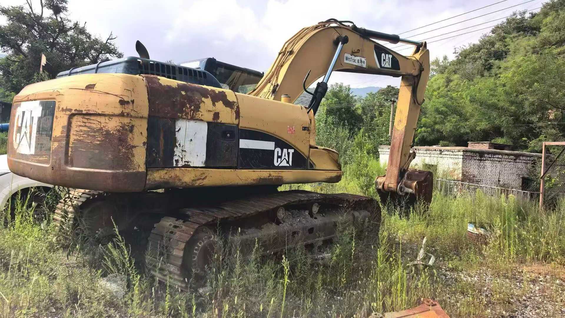 شراء حفارة Caterpillar 325B مستعملة / 3
