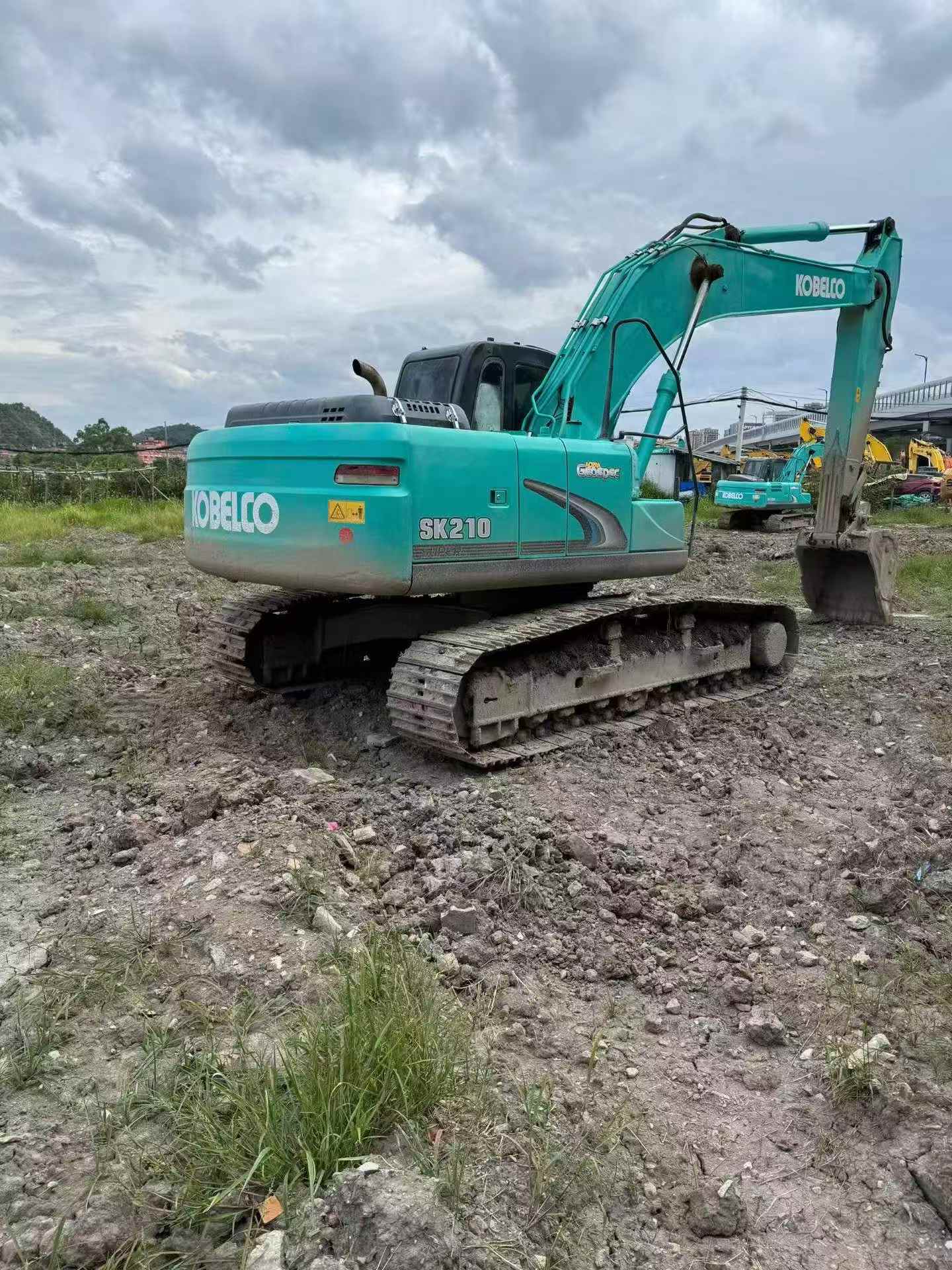 Buy Kobelco SK210 Used Excavator / 2