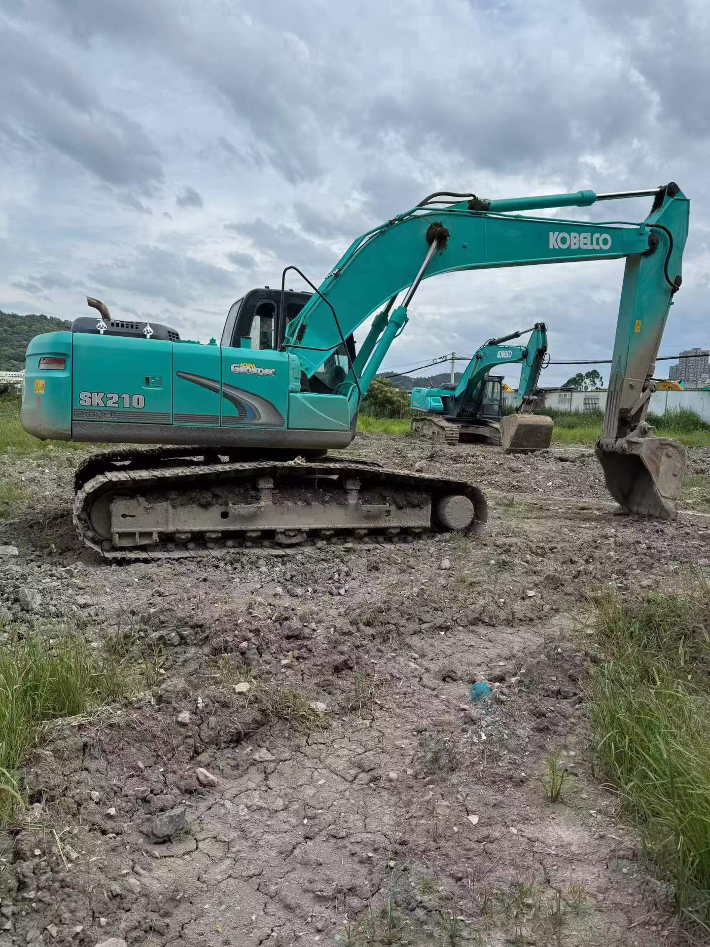 Buy Kobelco SK210 Used Excavator / 1