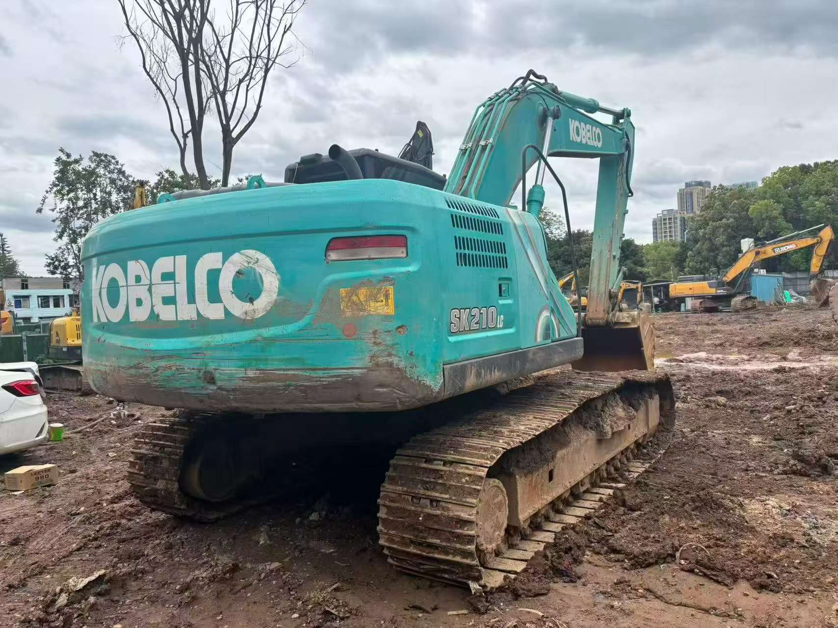 Buy Kobelco SK210 Used Excavator / 4