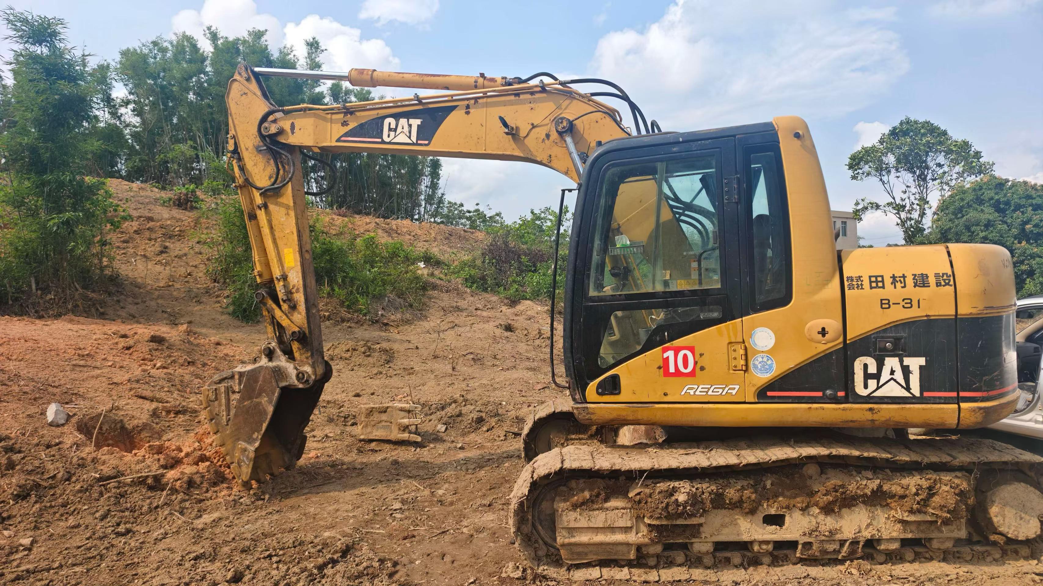 Comprar Caterpillar 311C Usado Excavadora
