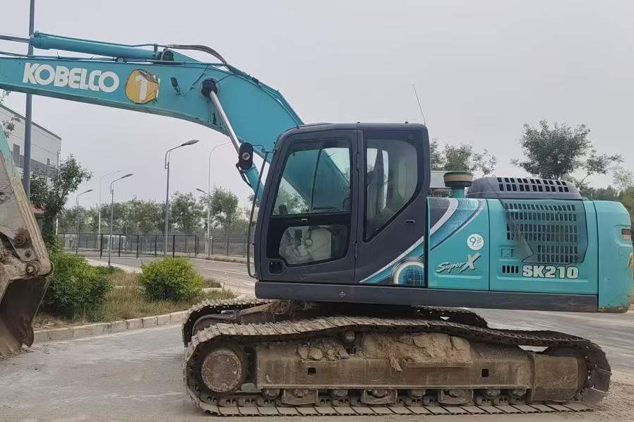 Купить Подержанный Экскаватор Kobelco SK210 / 2