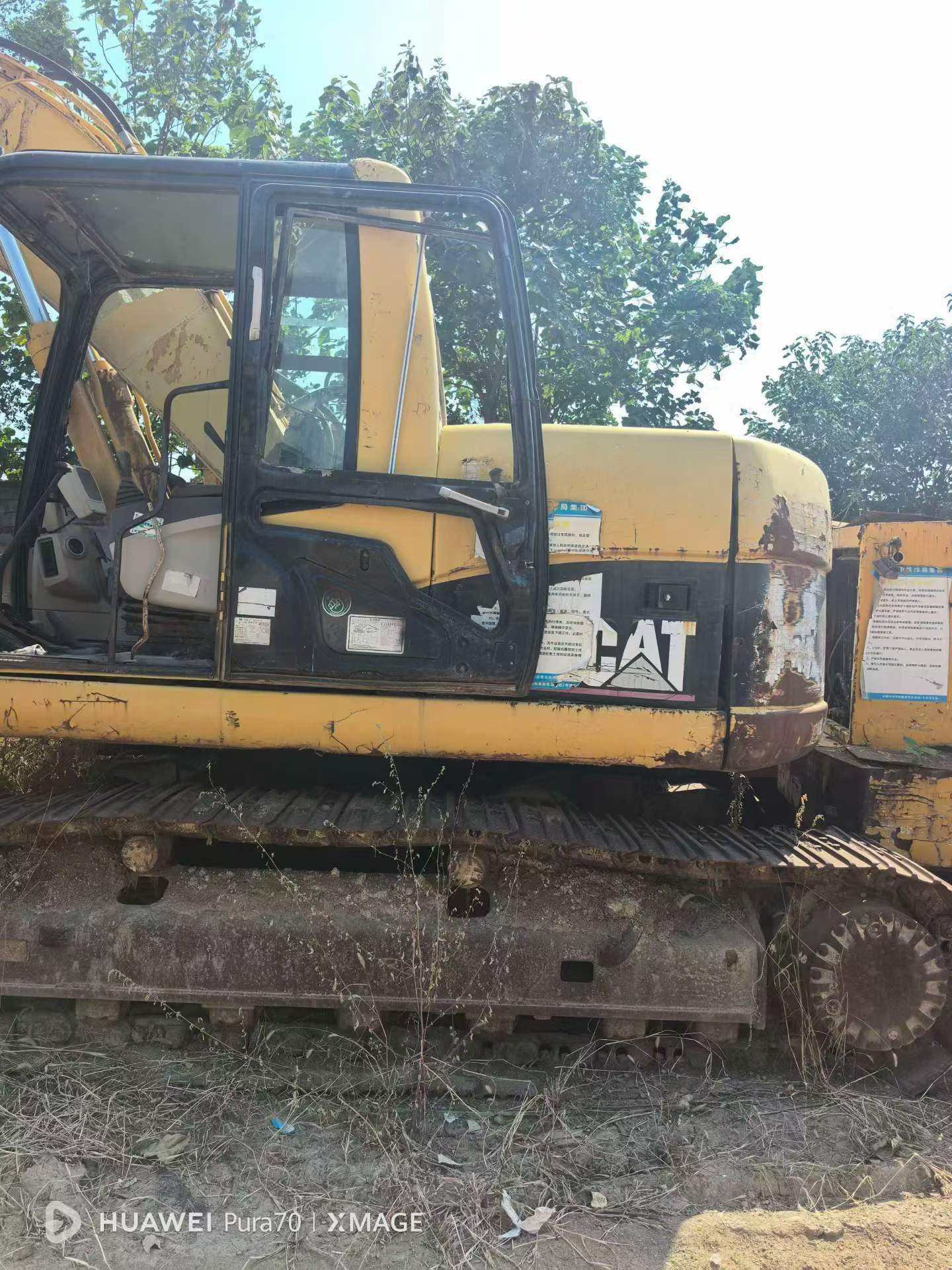 Купить Caterpillar 320CU Подержанный Экскаватор