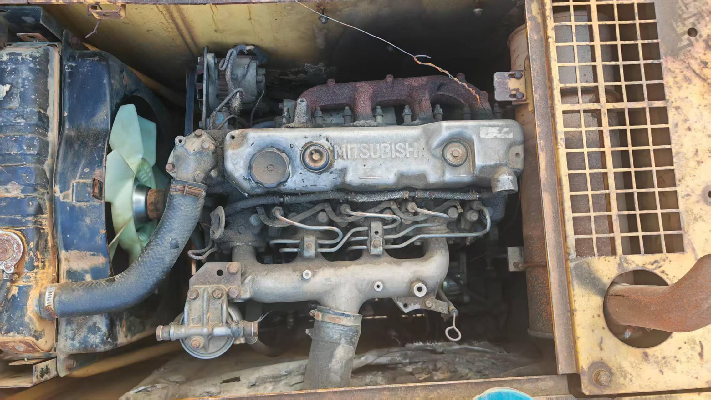 Compre Excavadora Caterpillar E70B Usada / 2