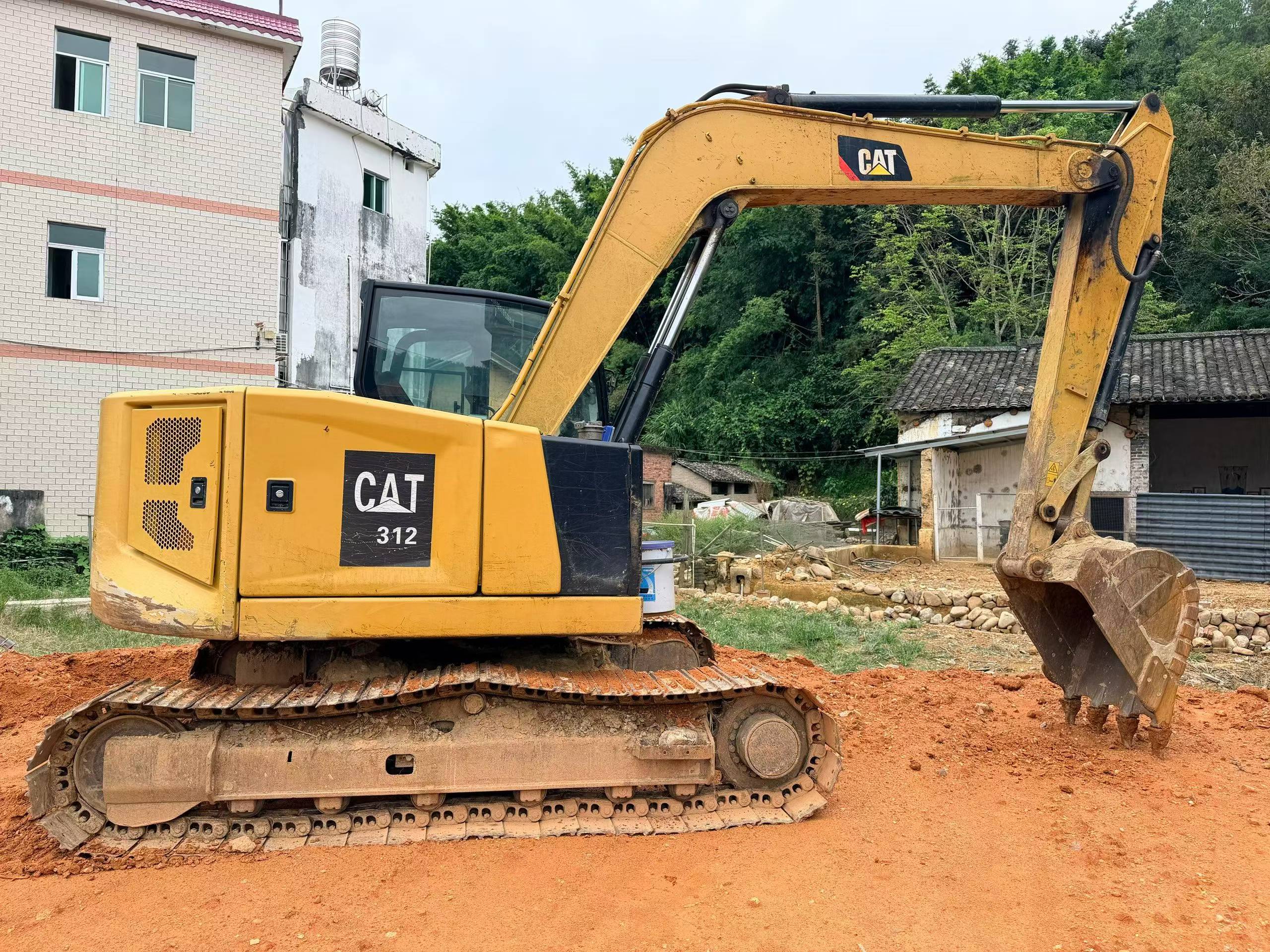 Comprar Caterpillar CAT310  Usado Excavadora