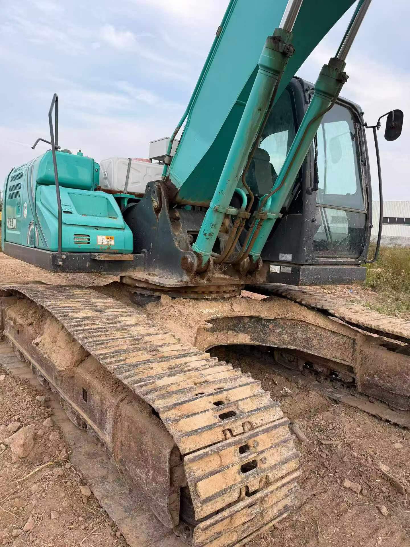 Buy Kobelco SK210 Used Excavator / 9