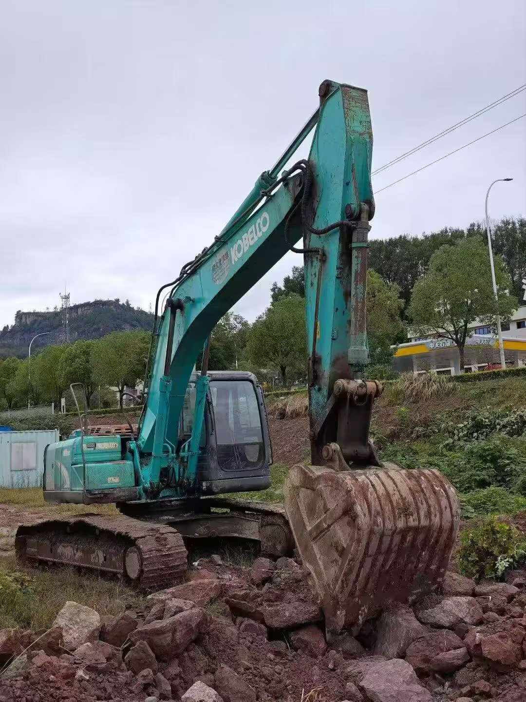Buy Kobelco SK210 Used Excavator / 4