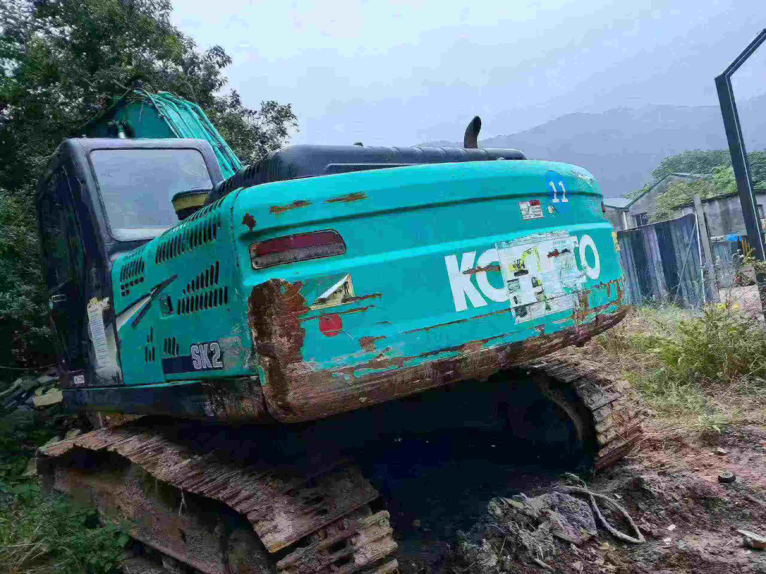 Buy Kobelco SK210 Used Excavator / 4