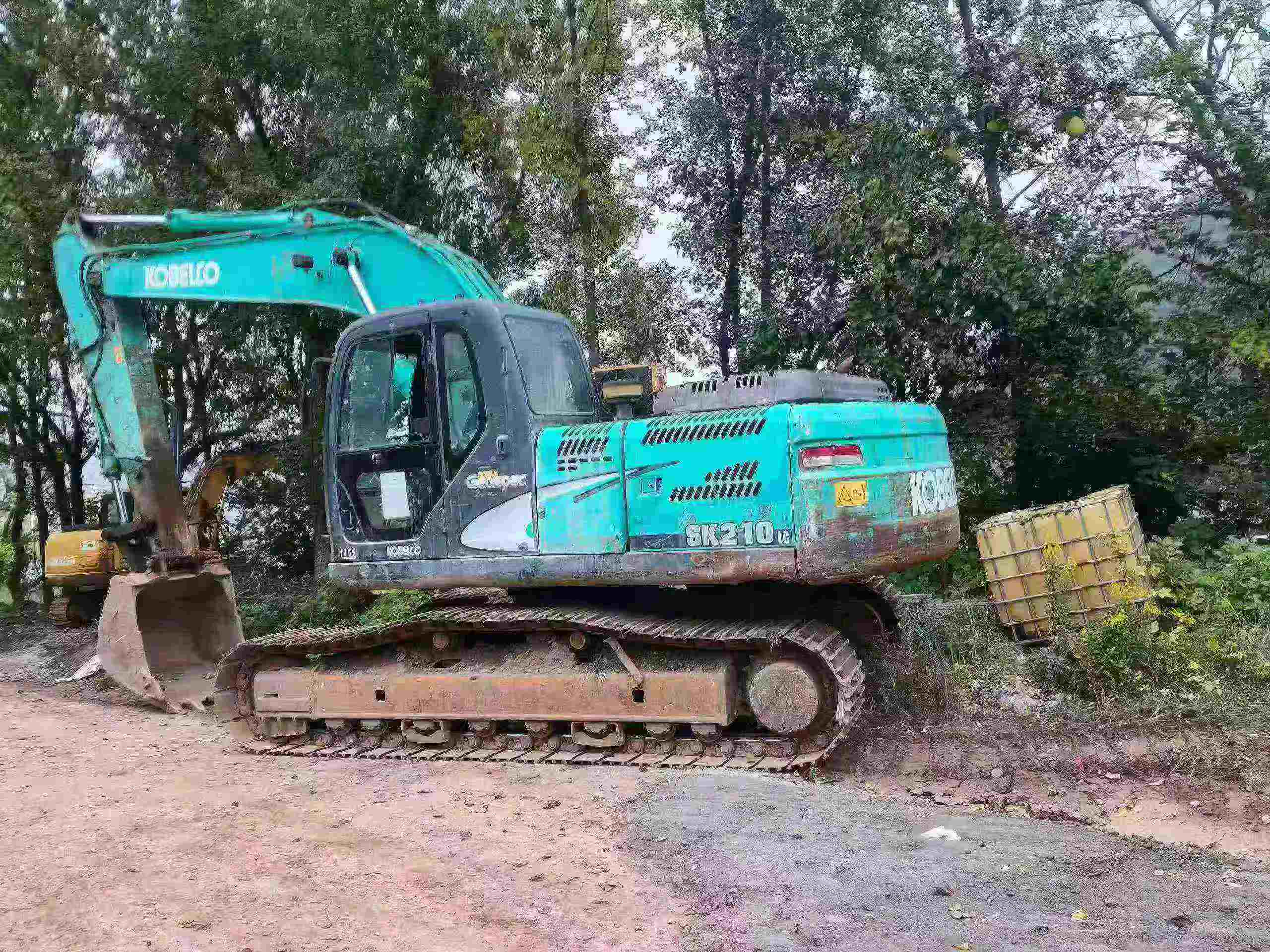 Buy Kobelco SK210 Used Excavator / 7