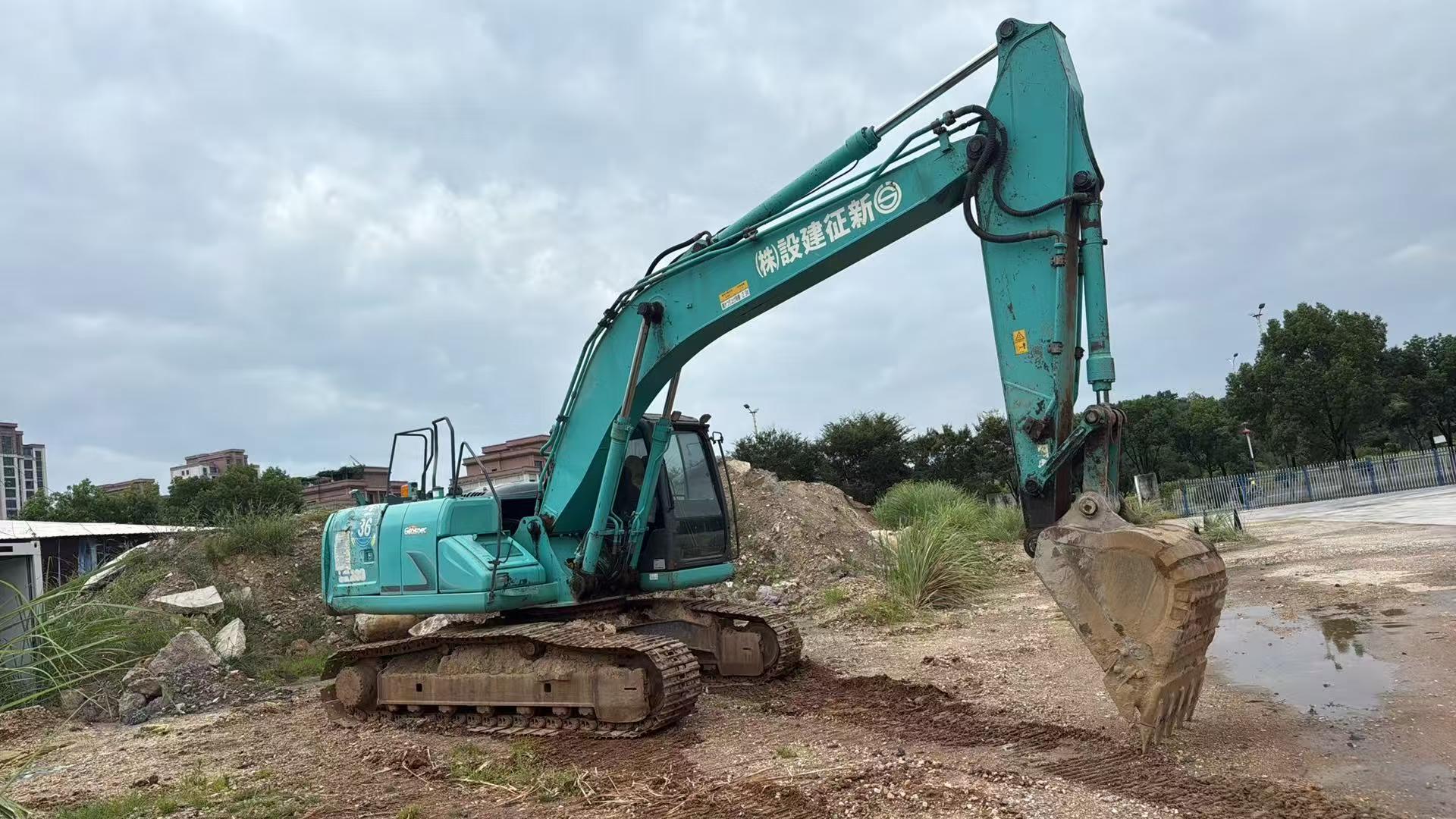 Buy Kobelco SK200 Used Excavator / 9