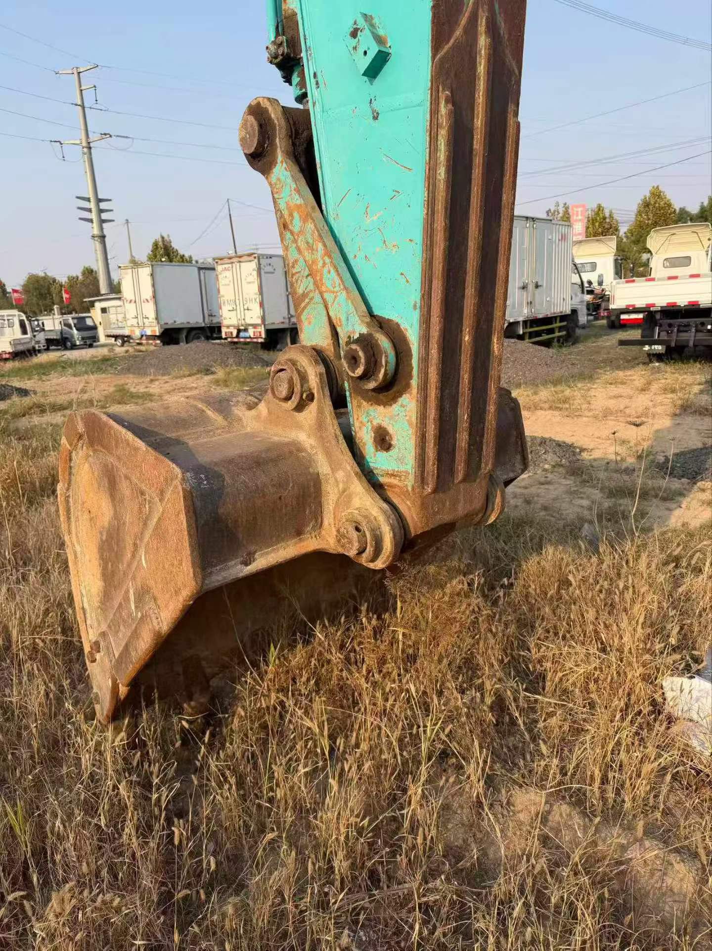 Buy Kobelco SK210 Used Excavator / 4