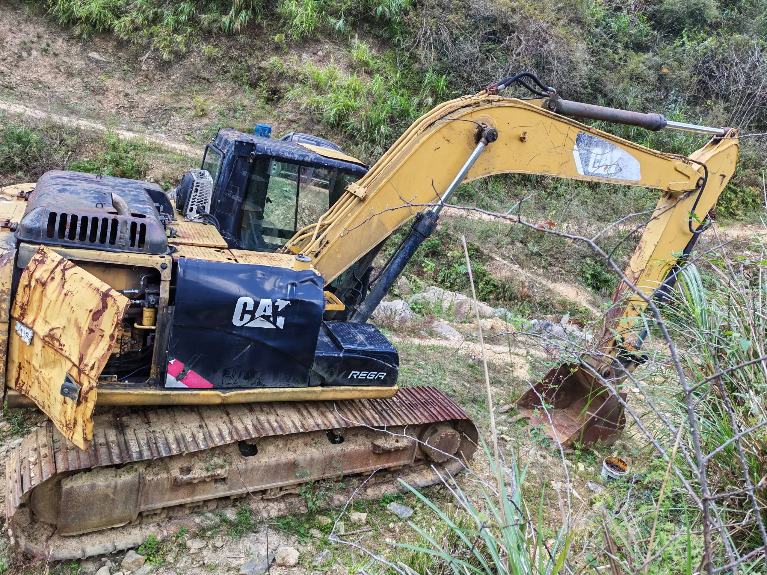 شراء Caterpillar M318 مستعمل حفارة